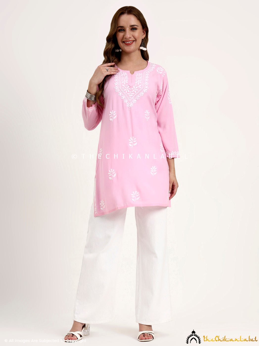 Designer chikankari short top made from rayon fabric with artisan handwork.