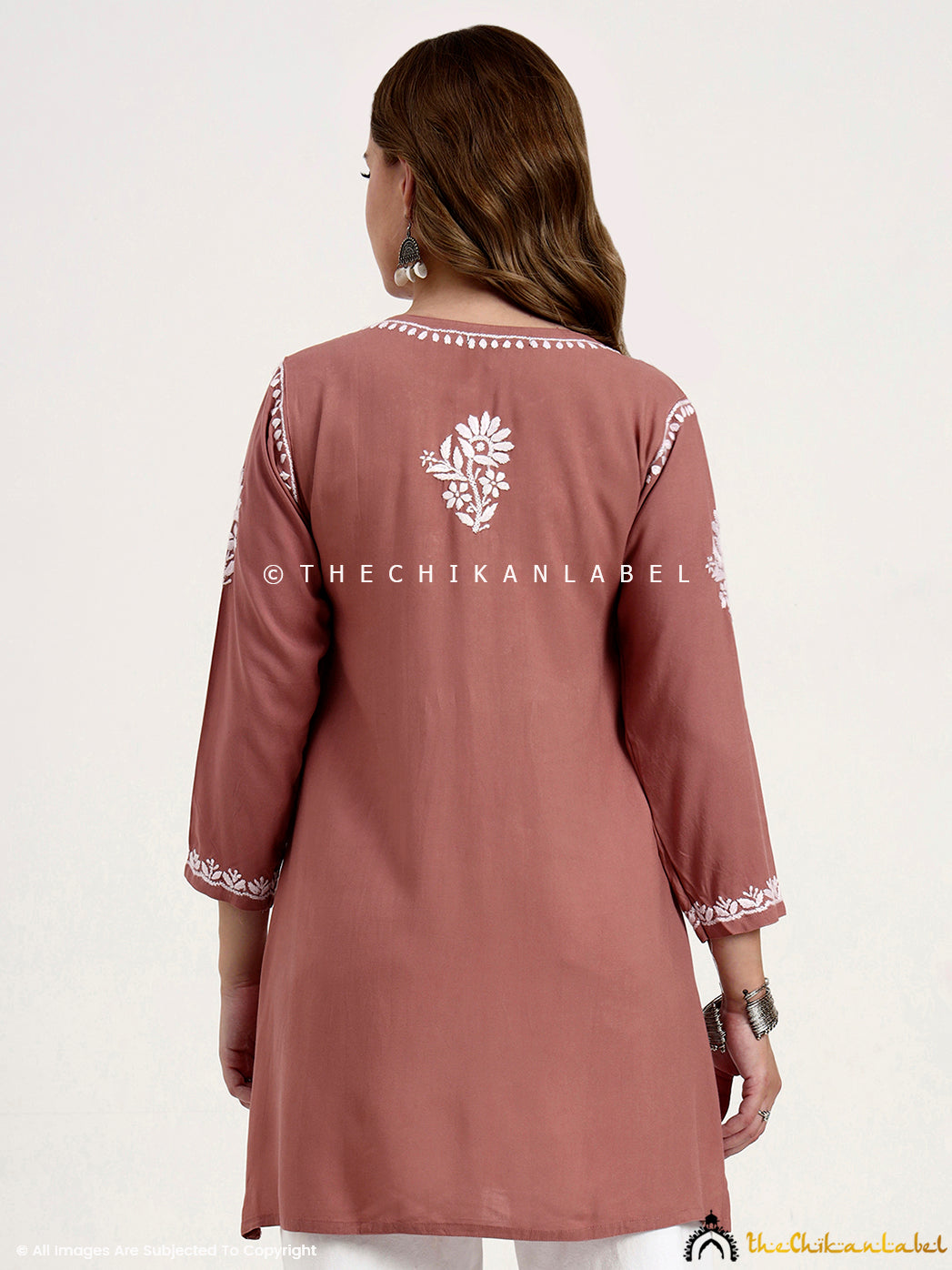 Stylish rayon chikankari short kurti top handmade by skilled artisans.