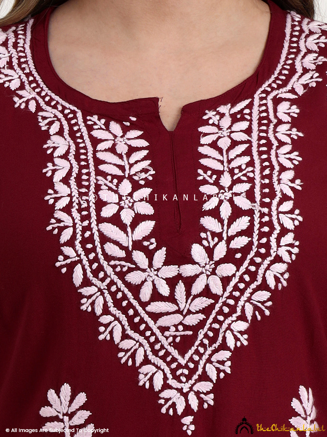 Hand embroidered rayon short chikankari top designed for comfort and elegance.
