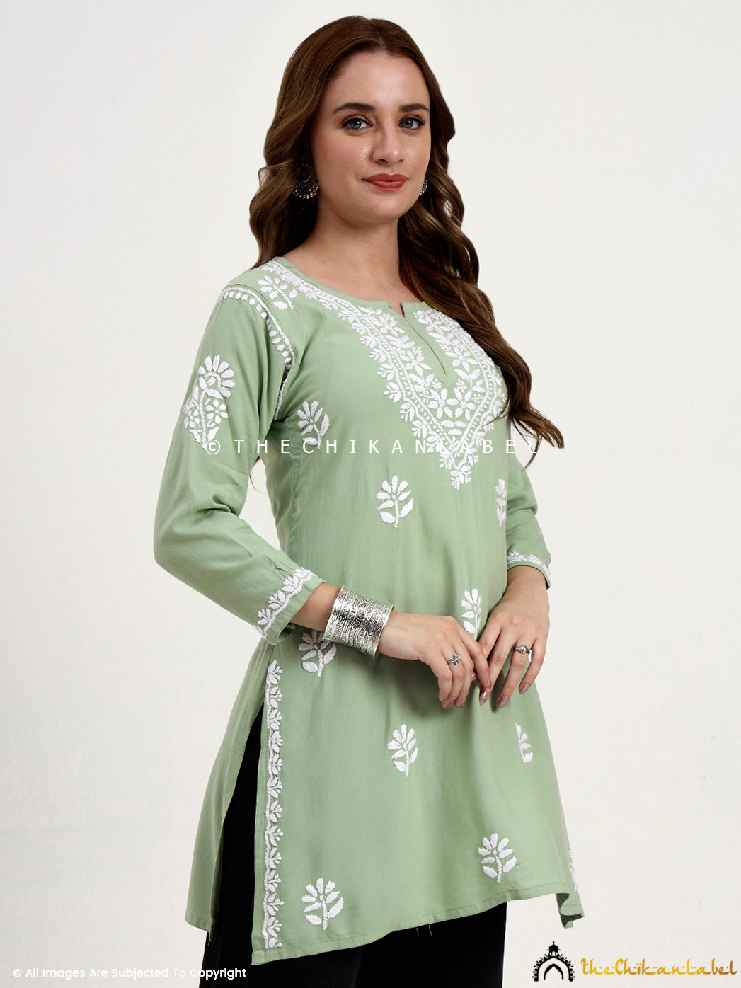Women’s rayon chikankari short kurti top combining heritage embroidery with modern style.