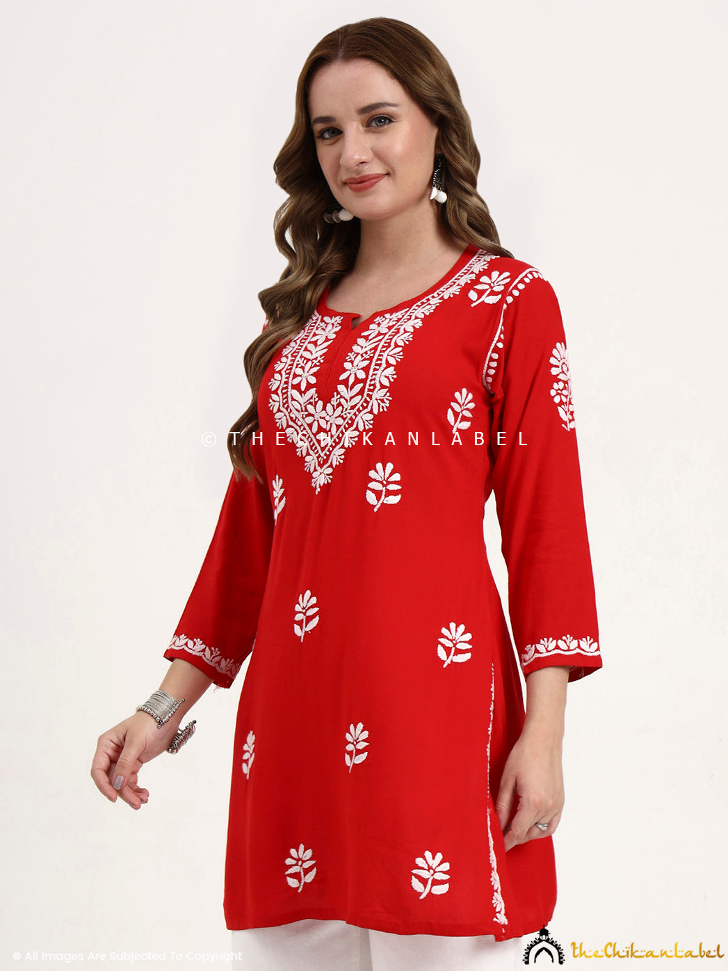 Stylish chikankari short top in rayon fabric, perfect for modern ethnic outfits.