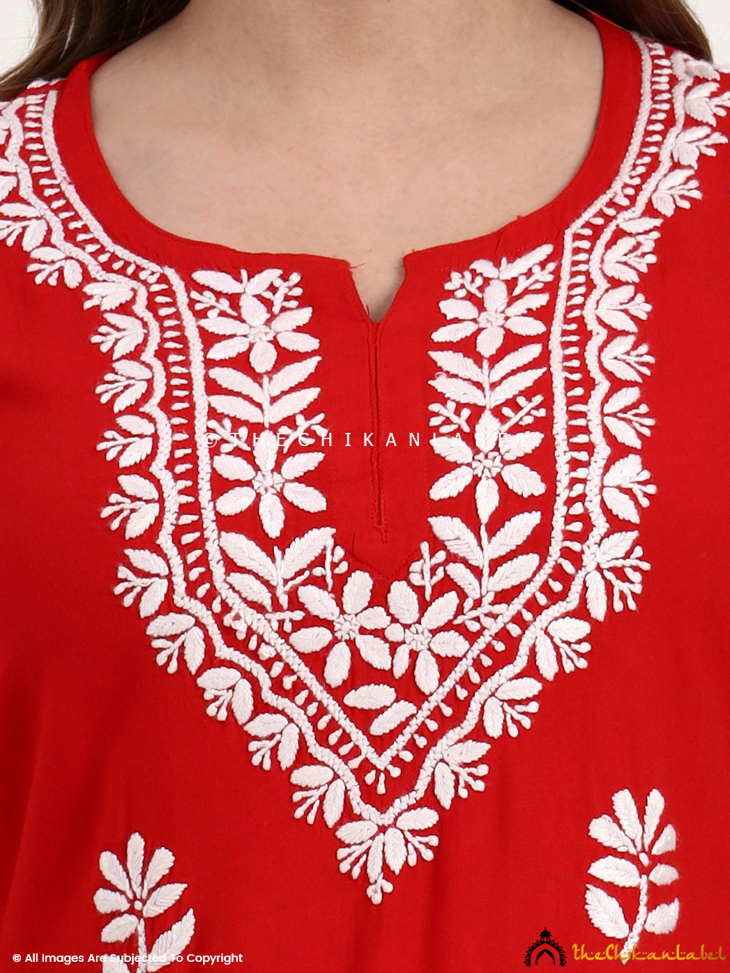 Rayon chikankari short top with floral embroidery crafted by skilled artisans.