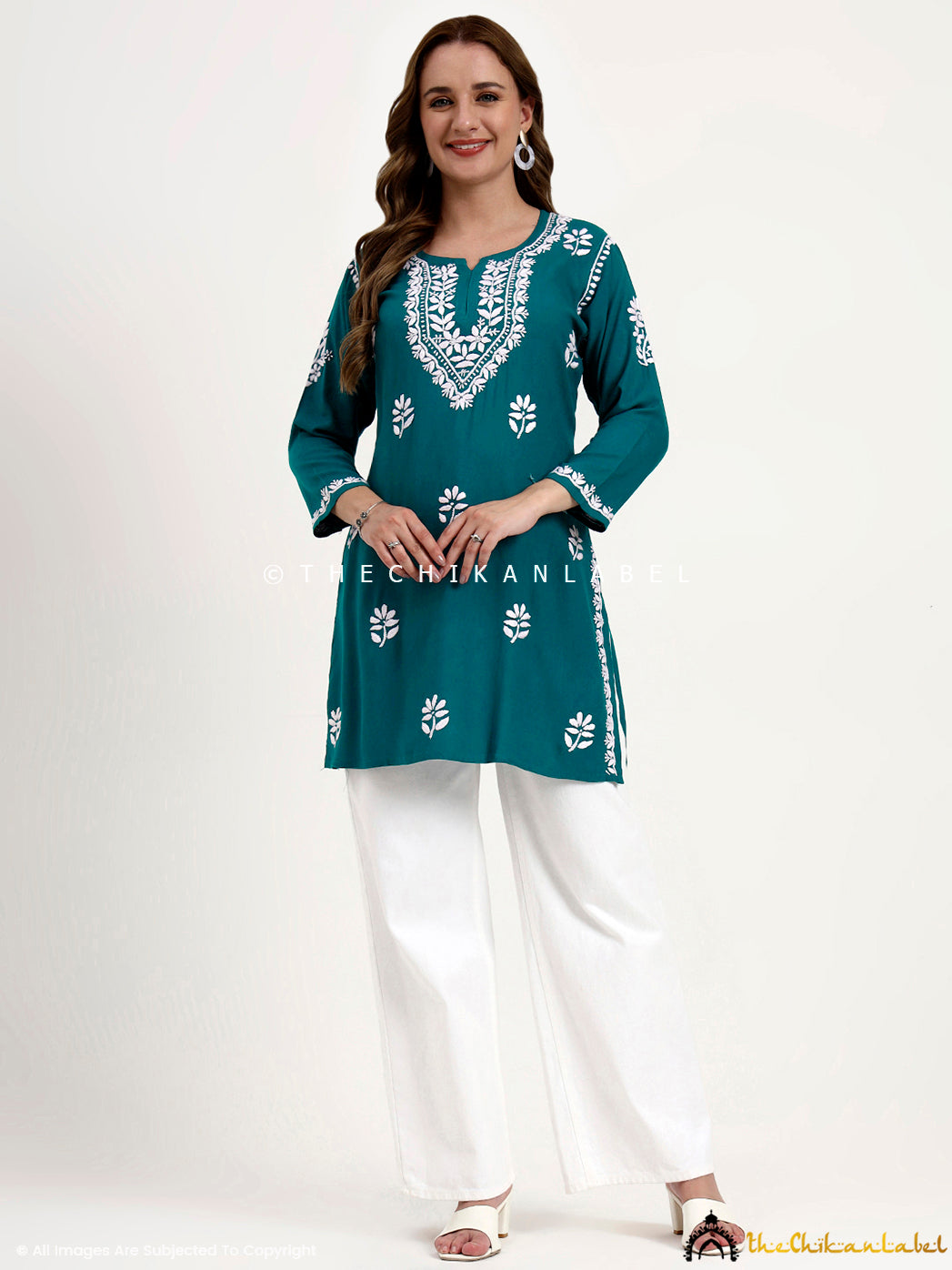 Rayon chikankari embroidered short top styled for ethnic and Indo-western outfits.