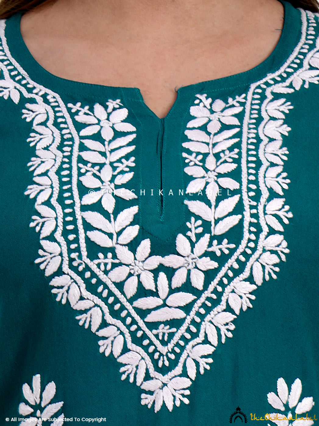 Traditional chikankari embroidery on rayon short kurti top designed for modern women.