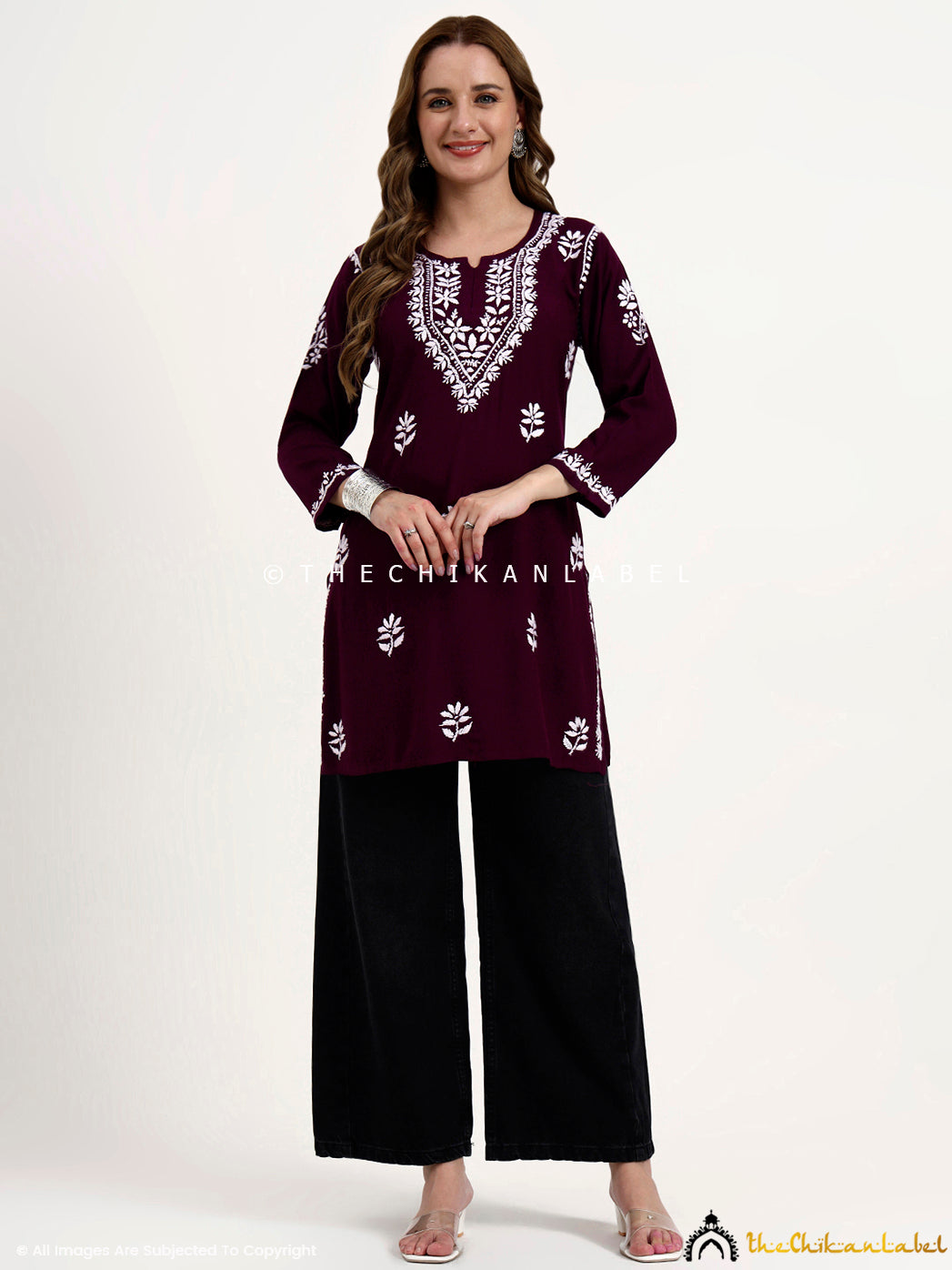 Designer chikankari short top made from rayon fabric with artisan handwork.