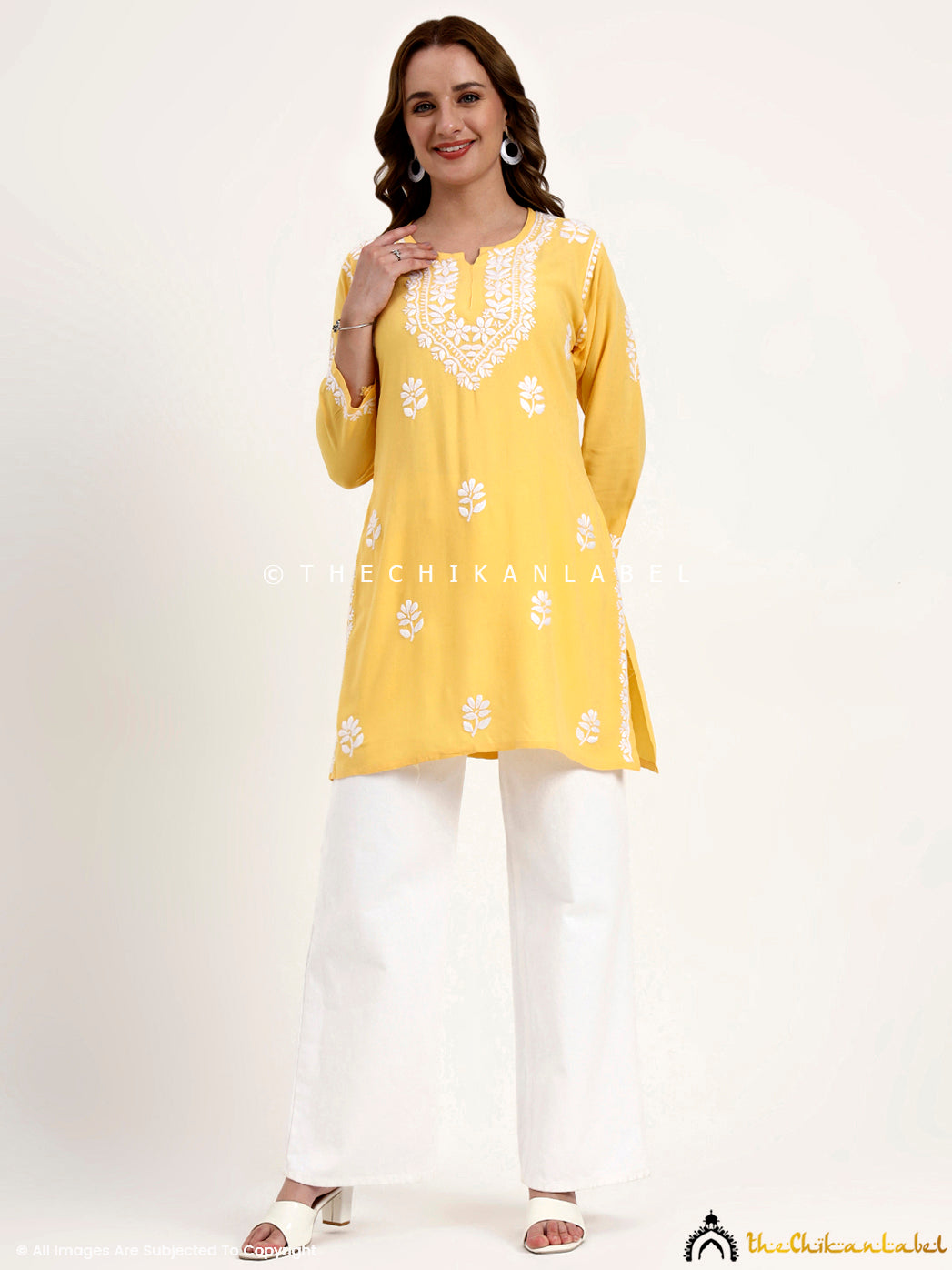 Designer chikankari short top made from rayon fabric with artisan handwork.