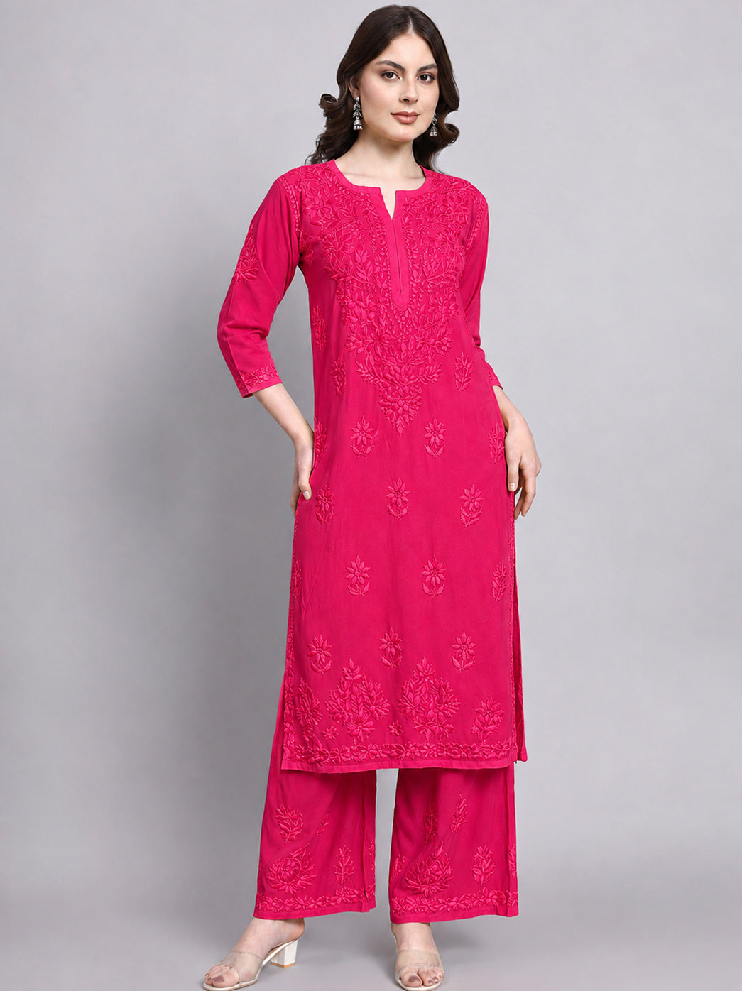 Elegant kurti palazzo set featuring intricate chikankari work on soft rayon fabric, suitable for family gatherings, celebrations and everyday occasions.