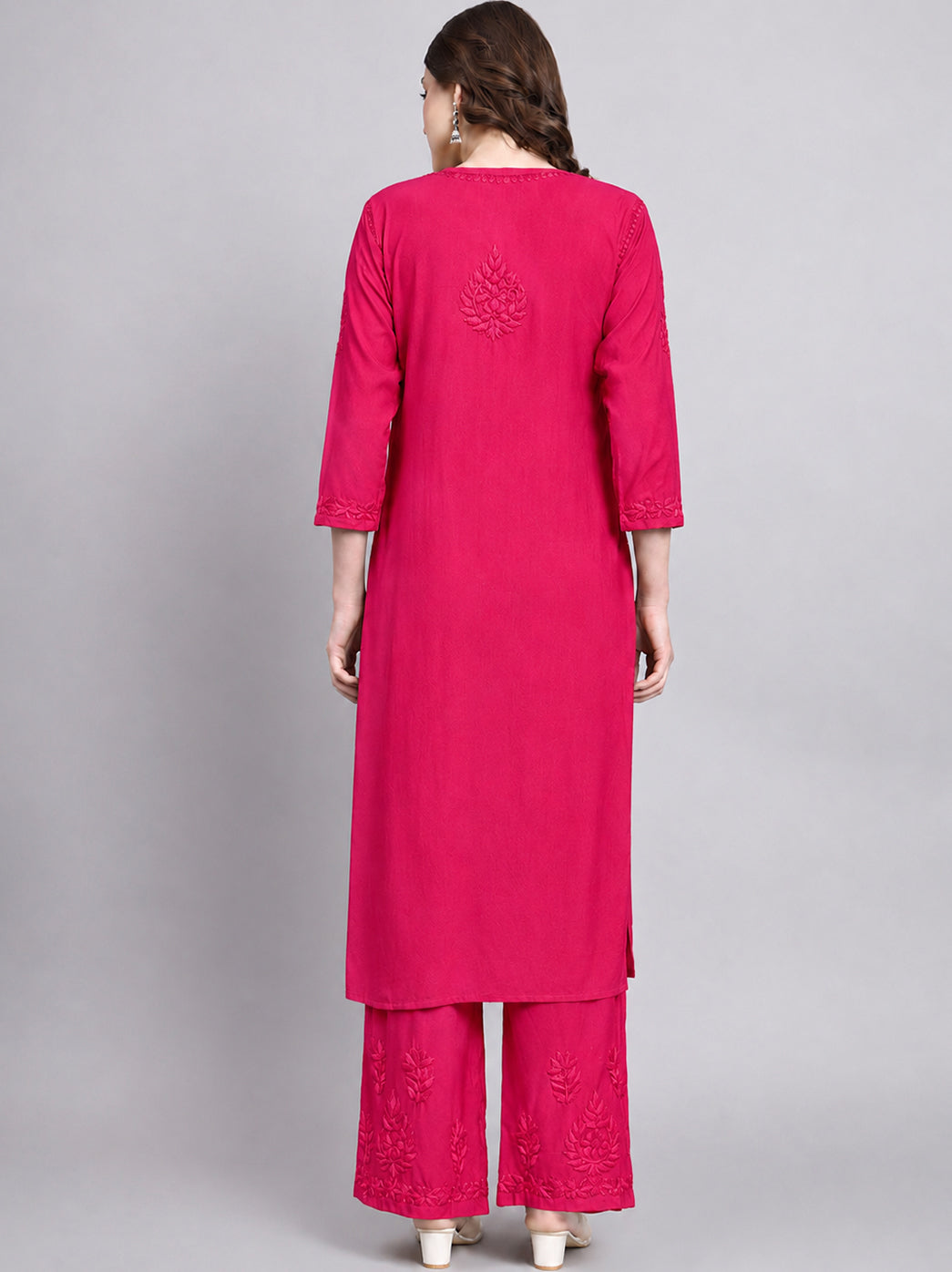 Traditional chikankari kurta set in soft rayon with embroidered straight kurti and matching palazzo, ideal for festive events and semi formal occasions.