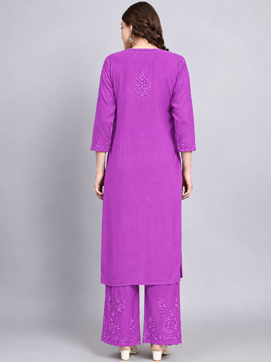 Women’s embroidered rayon kurta and palazzo set featuring detailed chikankari inspired floral work and a comfortable straight fit for all day wear.