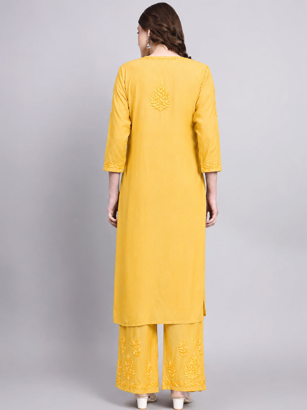 Trending chikankari set with straight kurti, three quarter sleeves and coordinated palazzo designed for festive, office and casual ethnic wear.