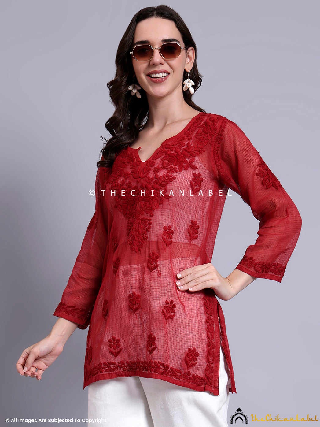 Stylish chikankari short top with artisan embroidery, perfect for everyday or semi-formal wear.

