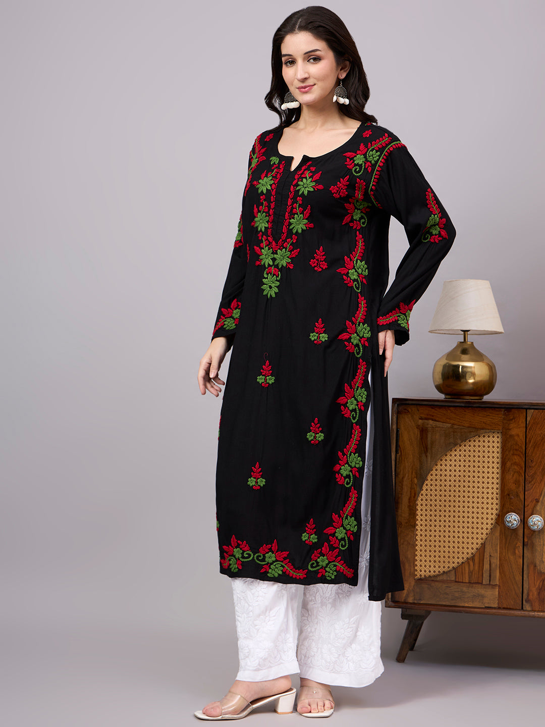 Women's ethnic Rayon Straight Kurti featuring traditional Lucknow Chikankari craftsmanship, soft fabric, full sleeves, and graceful straight-cut design for effortless elegance.