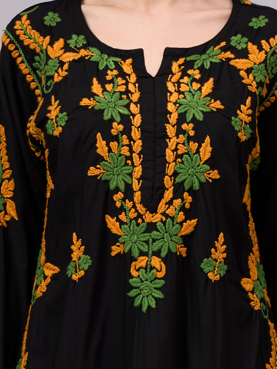 Women's trending kurti featuring authentic Lucknow Chikankari embroidery, soft rayon construction, straight silhouette, and versatile styling for every occasion.