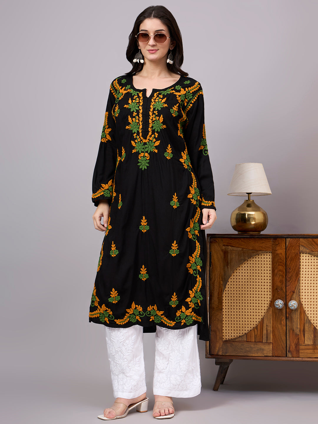 Women's handcrafted Chikankari Kurta with premium rayon fabric, elegant floral embroidery, classic neckline, straight fit, and timeless ethnic design for everyday elegance.