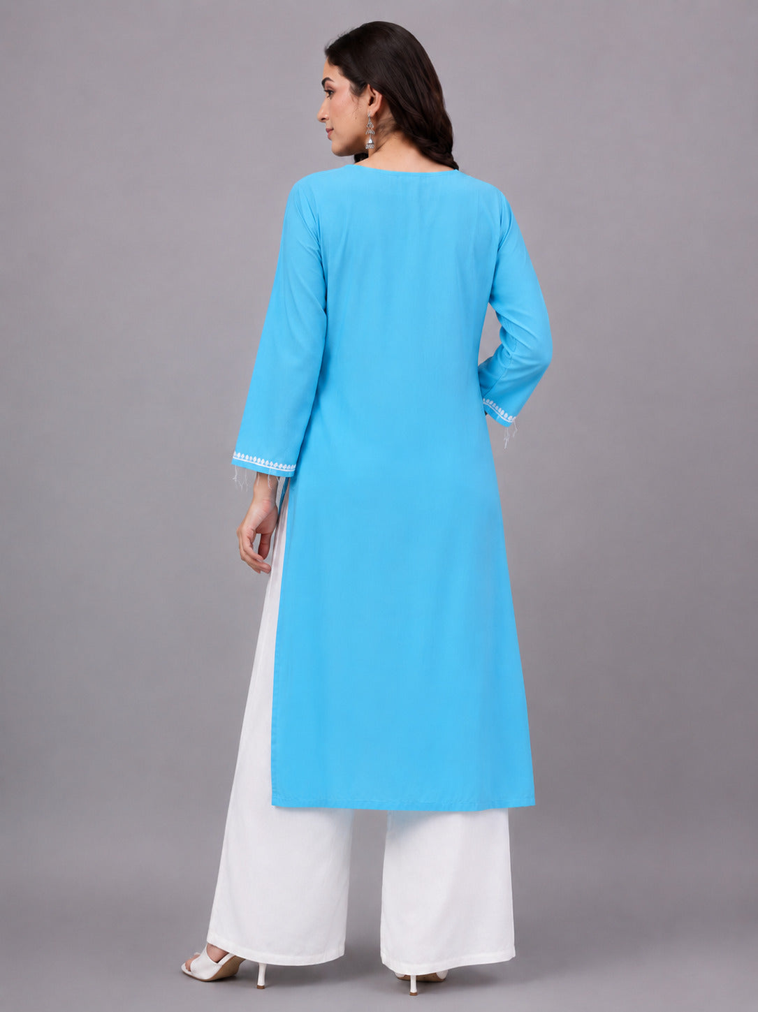 Premium embroidered rayon straight kurti featuring intricate Chikankari work, lightweight fabric, and a comfortable silhouette ideal for modern women seeking everyday style.