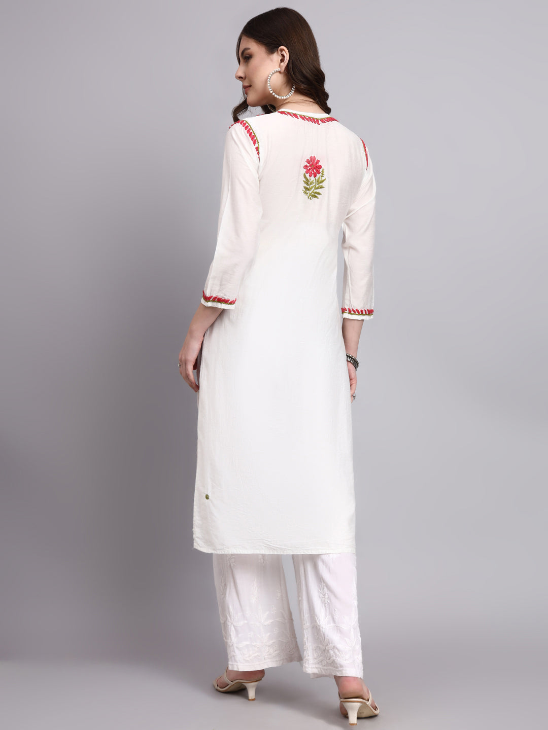 Women’s trending long kurti showcasing hand-embroidered chikankari motifs on a straight-fit Chanderi silhouette