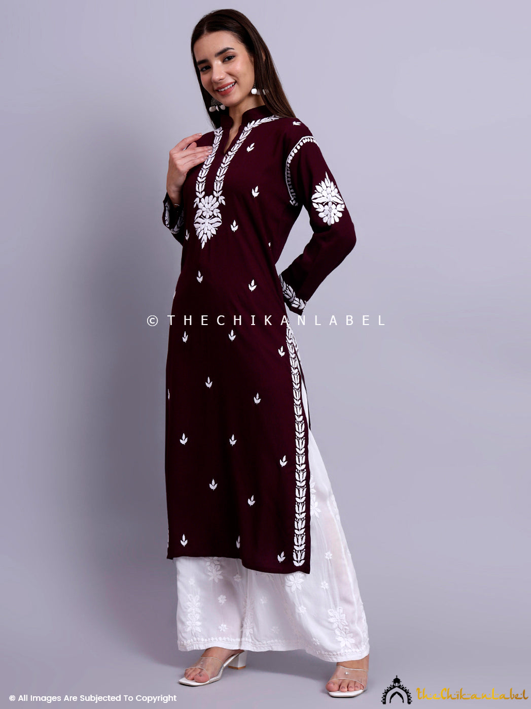 Elegant straight rayon kurti with full-sleeve design and classic chikankari floral embroidery pattern.

