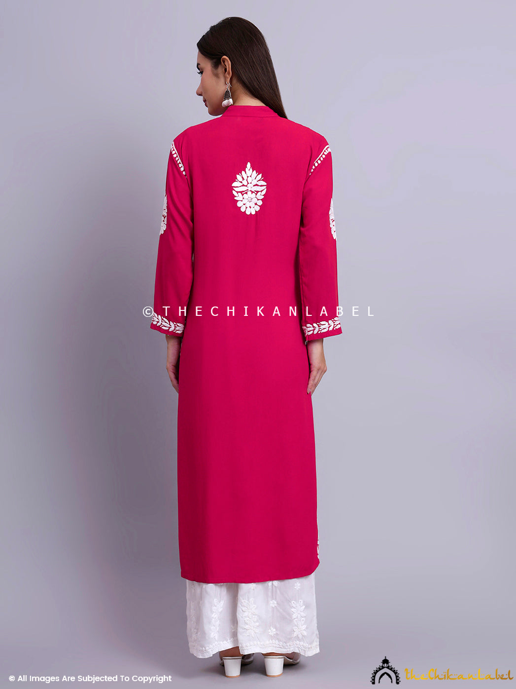 Classic chikankari kurti with refined embroidery and minimal styling, ideal for semi-formal occasions.

