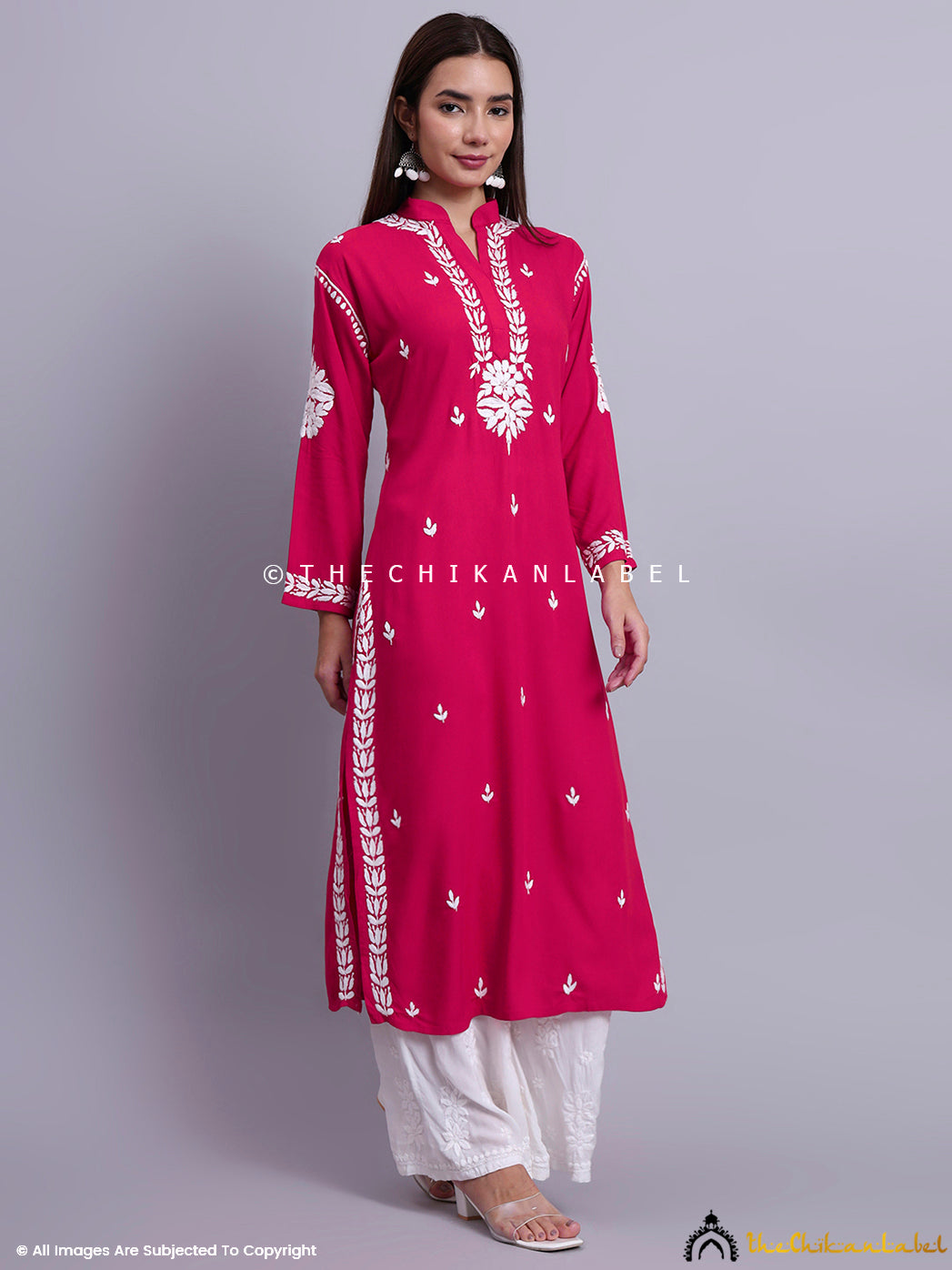 Model showcasing handcrafted chikankari embroidery on soft rayon fabric with a clean finish.


