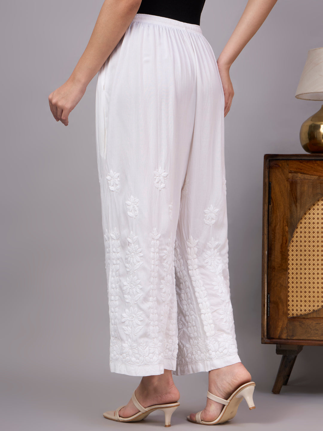 Comfortable regular wear bottom with beautiful Chikankari embroidery and straight fit silhouette perfect for daily ethnic outfits