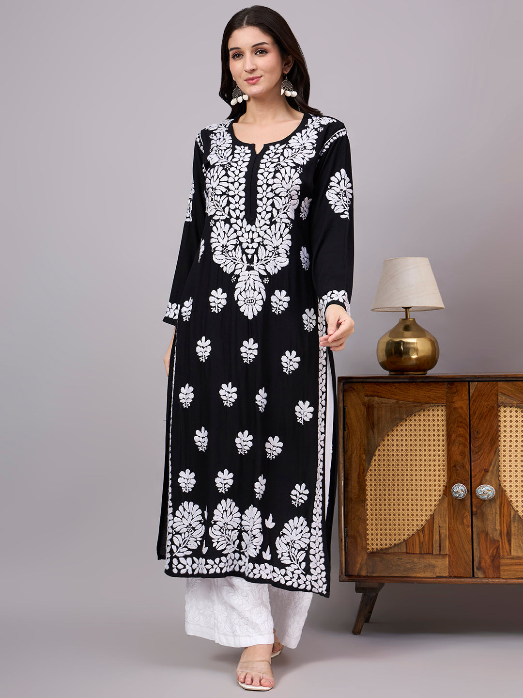 Women's handcrafted Rayon Straight Kurti featuring authentic Lucknow Chikankari embroidery, breathable fabric, straight silhouette, and elegant ethnic design for everyday wear.