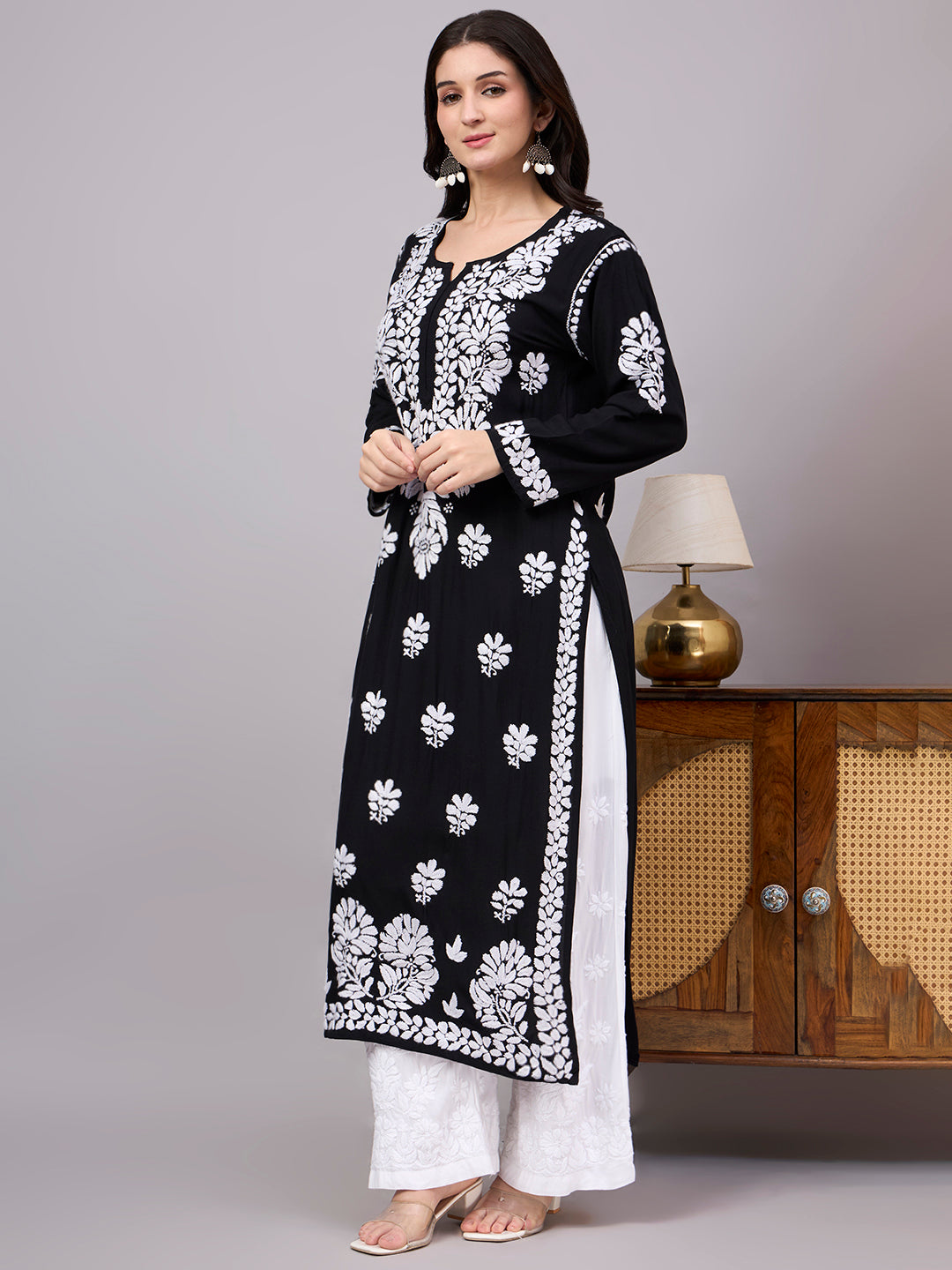 Elegant women's Chikankari Kurta showcasing authentic handcrafted floral embroidery on premium rayon fabric, designed for comfort, style, and all-day wear.