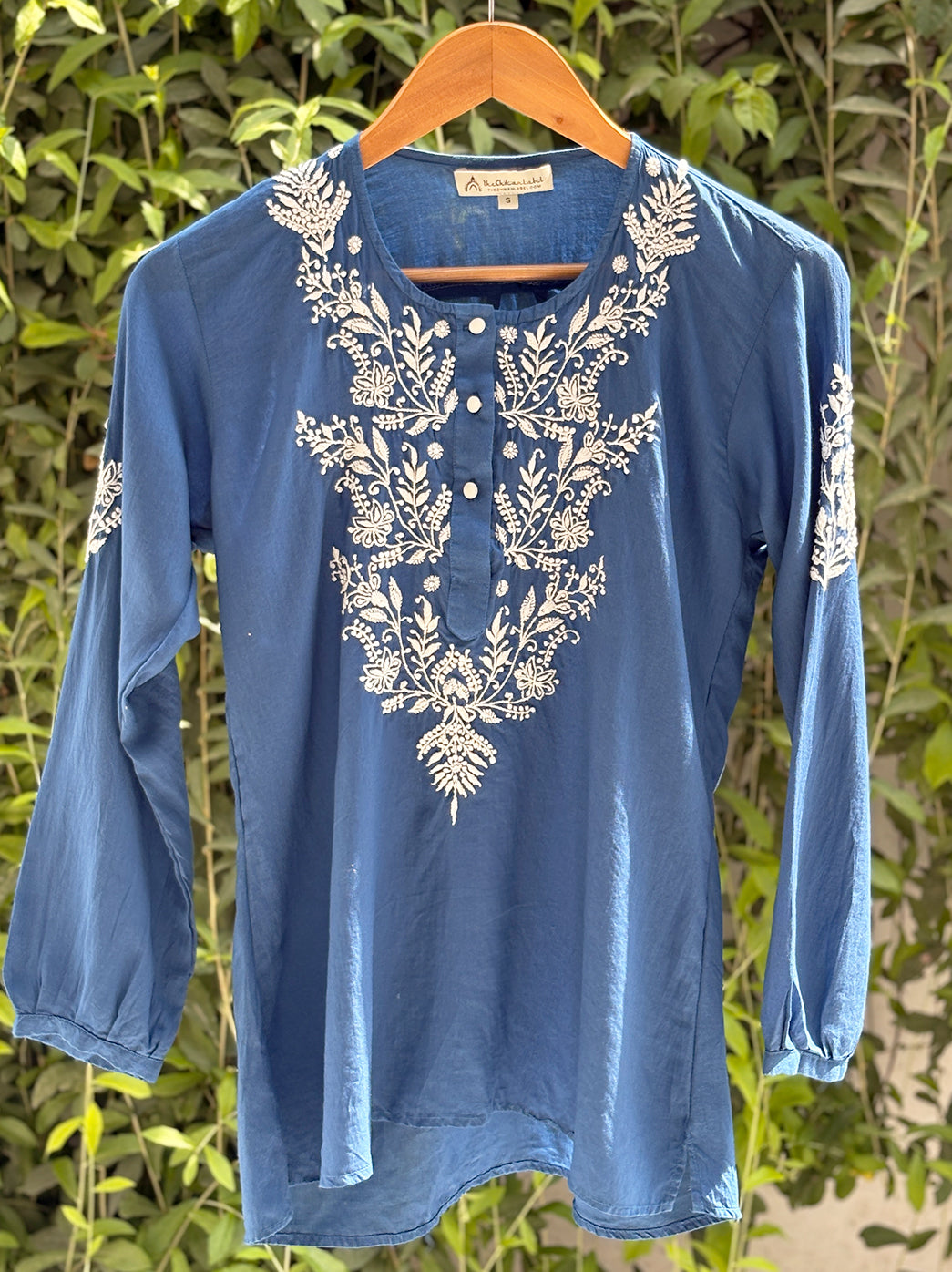 Premium chikankari shirt in soft mulmul cotton with elegant embroidery design and relaxed fit