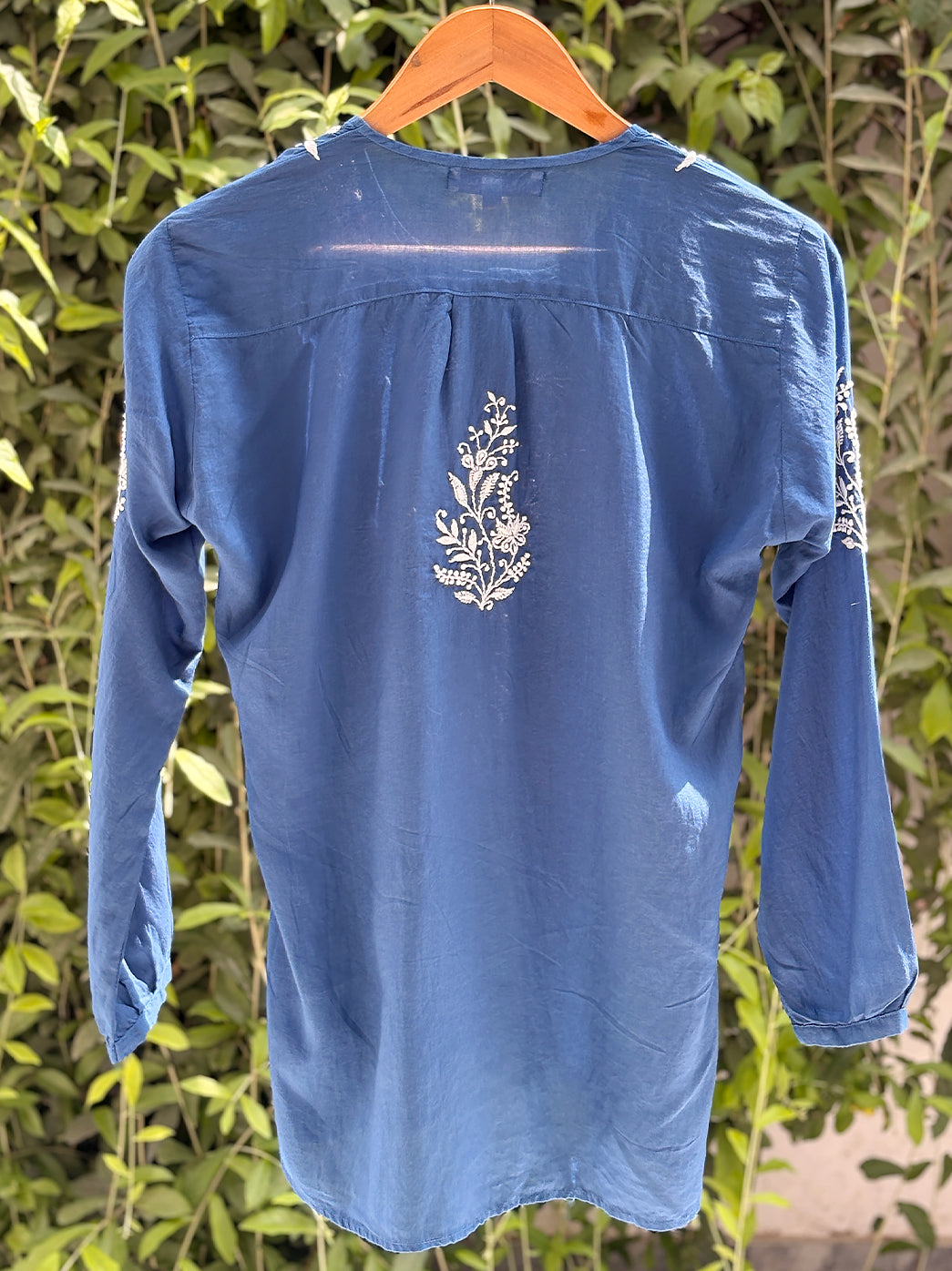 Hand embroidered chikankari shirt made from lightweight mulmul cotton for comfortable daily styling