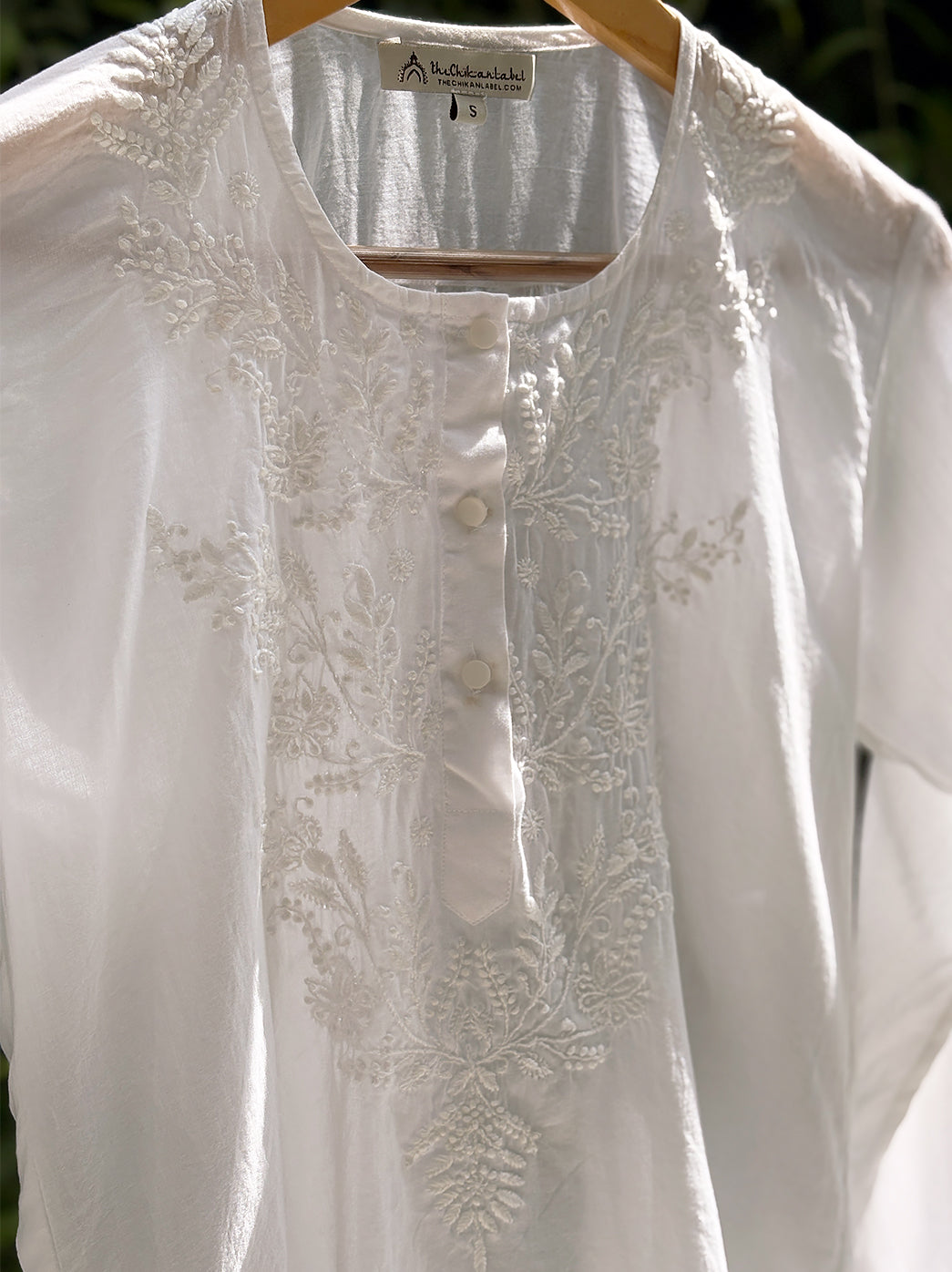 Fashionable chikankari shirt with traditional embroidery patterns and breathable mulmul cotton fabric