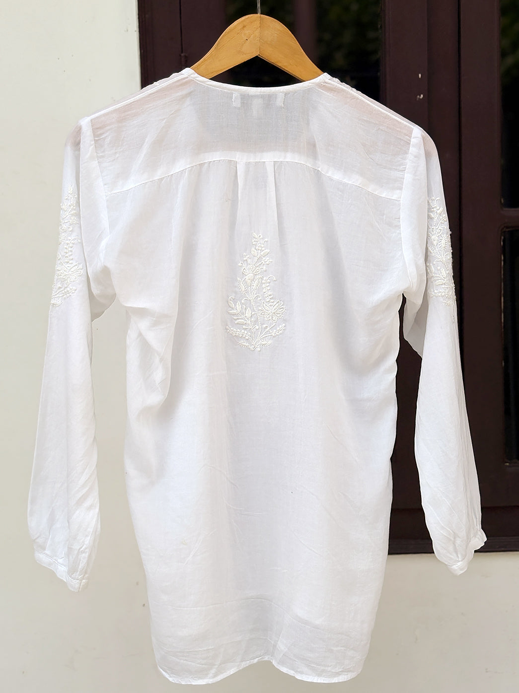 Elegant mulmul cotton chikankari shirt designed with detailed hand embroidery for modern ethnic styling
