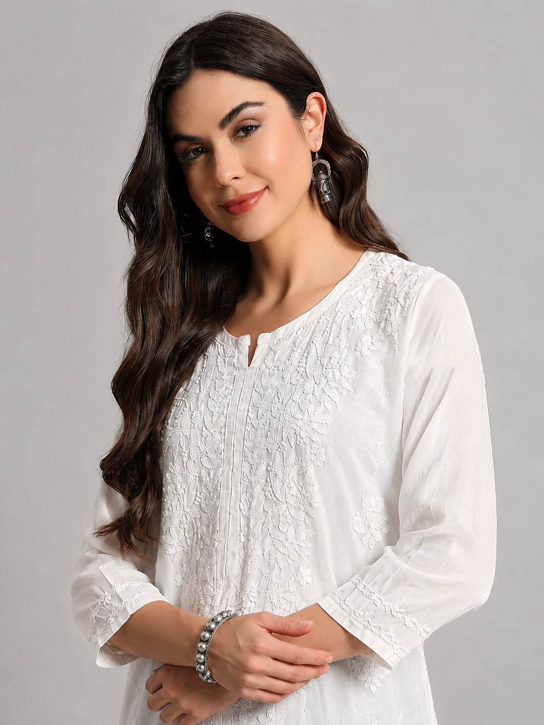 Beautiful Chikankari top designed with lightweight Chanderi fabric, intricate floral thread embroidery, and modern short kurti styling for women