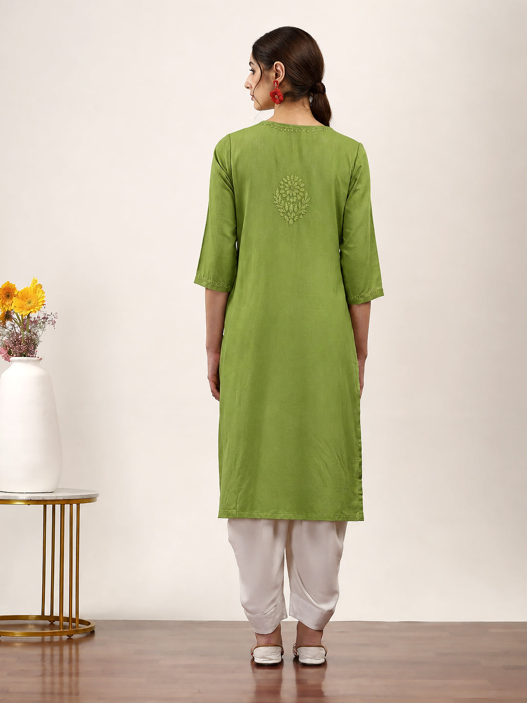 Women’s straight kurta with detailed floral Chikankari embroidery, rayon construction, relaxed straight fit and versatile design for everyday ethnic styling