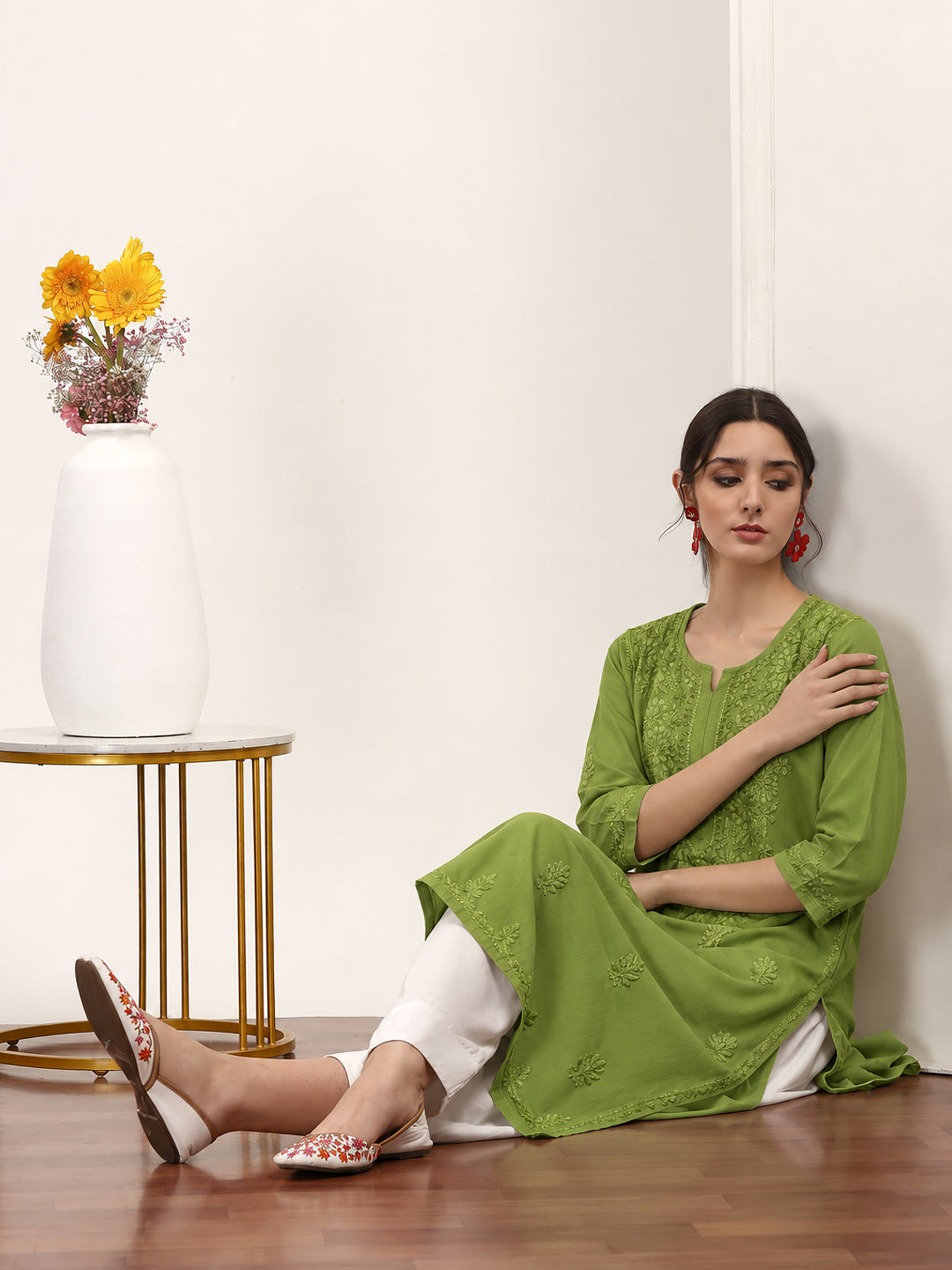 Saanvika Rayon Straight Kurta designed with intricate embroidery on the neckline, front panel, sleeves and lower body for a refined ethnic look