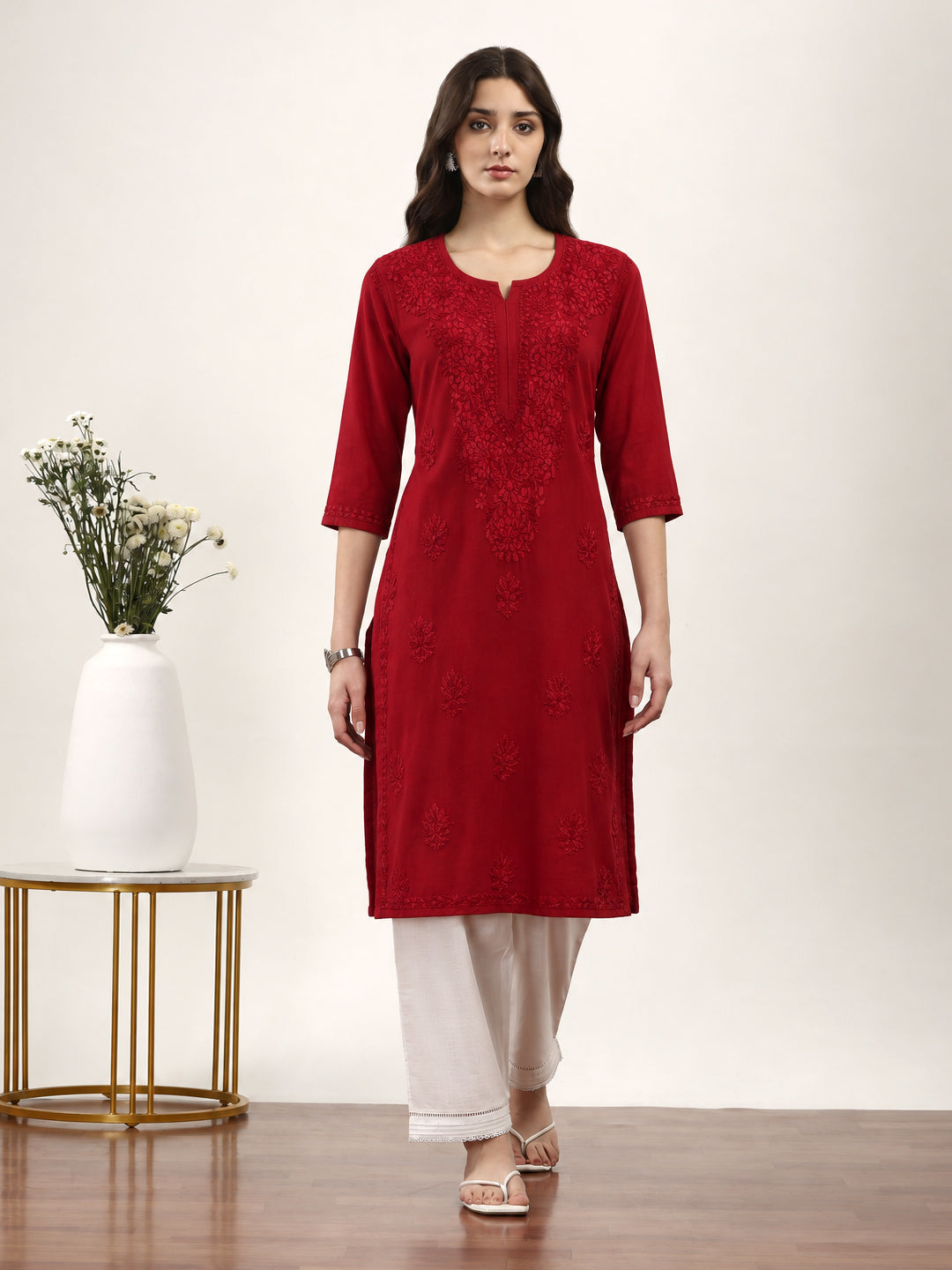 Comfortable women’s regular wear kurti featuring traditional Chikankari embroidery, straight-fit styling, three-quarter sleeves and a graceful round neckline