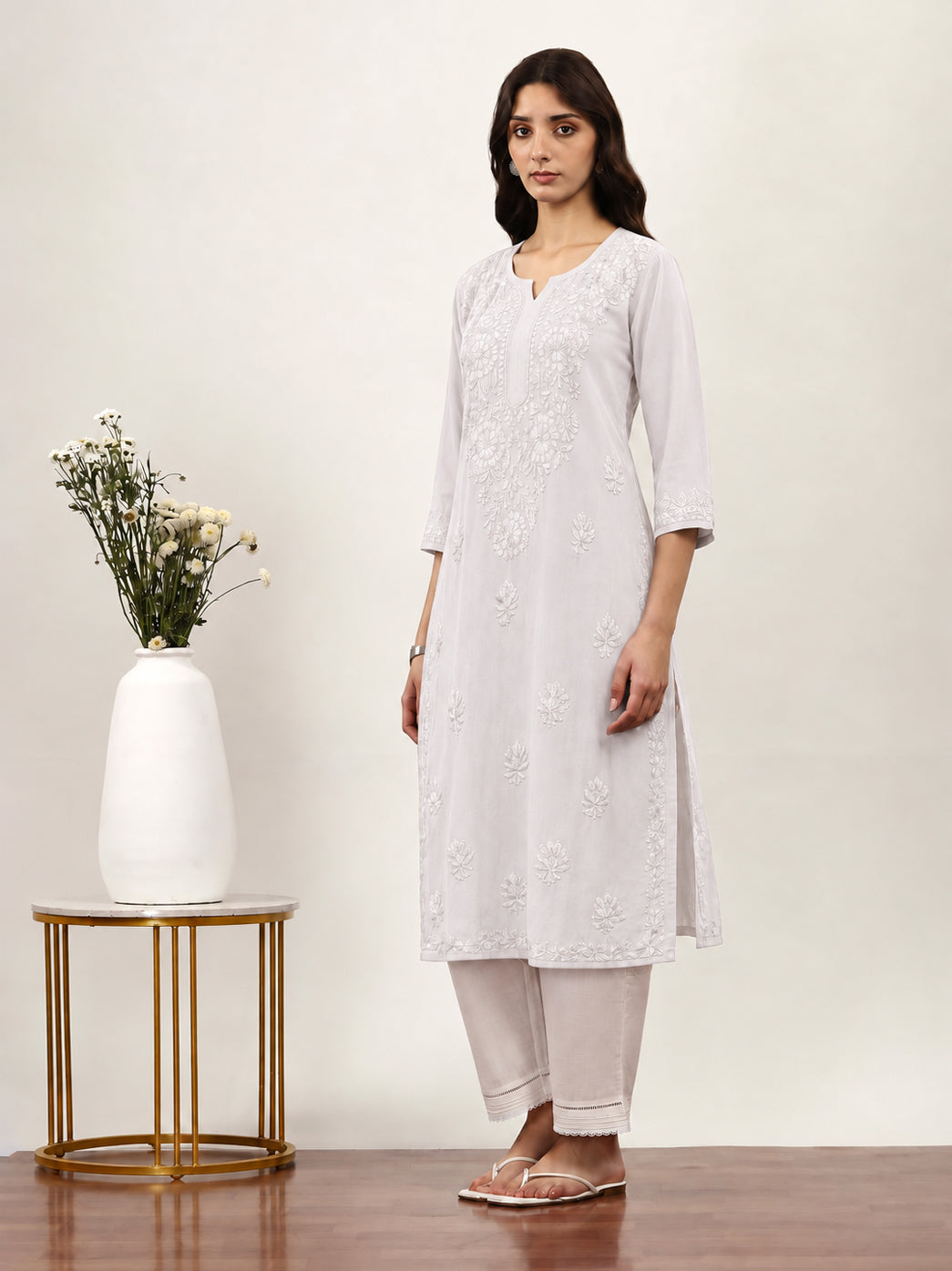 Saanvika embroidered straight kurta showcasing traditional Chikankari floral motifs across the front and sleeves with a comfortable design for women