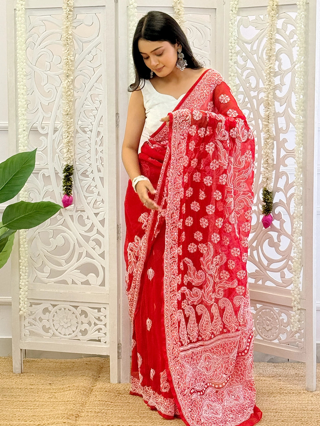 Beautiful chikankari georgette saree crafted by skilled artisans showcasing traditional Indian craftsmanship.