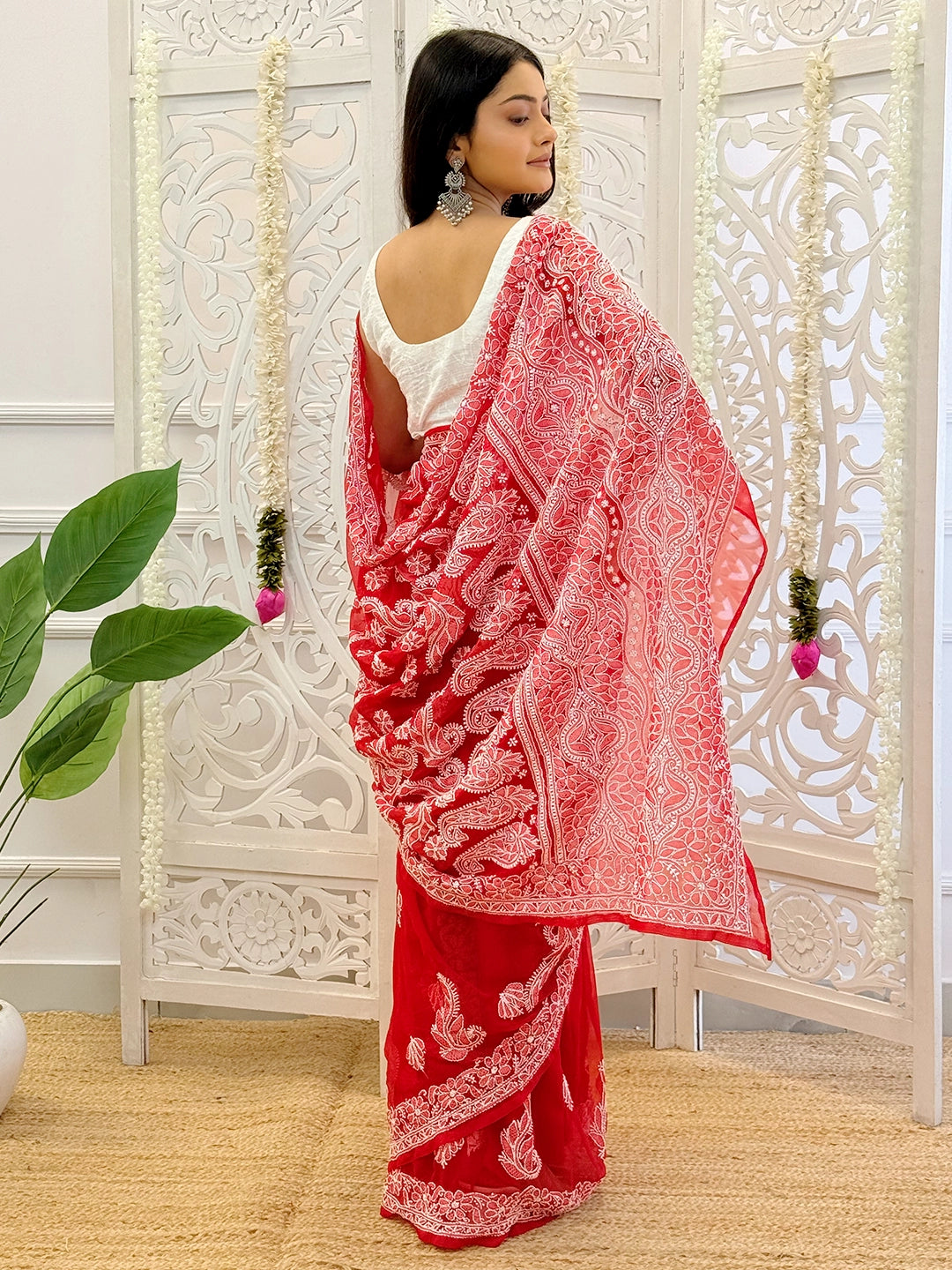 Authentic Lucknowi chikankari saree with detailed embroidery work perfect for weddings and ethnic celebrations.
