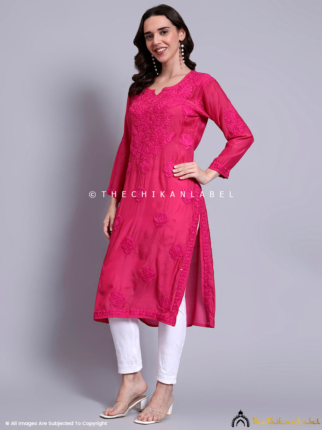Comfortable handcrafted kurti made in breathable muslin fabric featuring Lucknowi floral embroidery with a minimal aesthetic.

