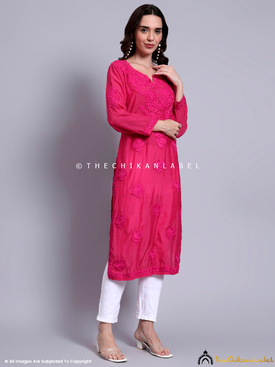 Side profile of model wearing straight muslin kurti with neckline embroidery and relaxed fit, suitable for formal and casual looks.

Side profile of model wearing straight muslin kurti with neckline embroidery and relaxed fit, suitable for formal and casual looks.

