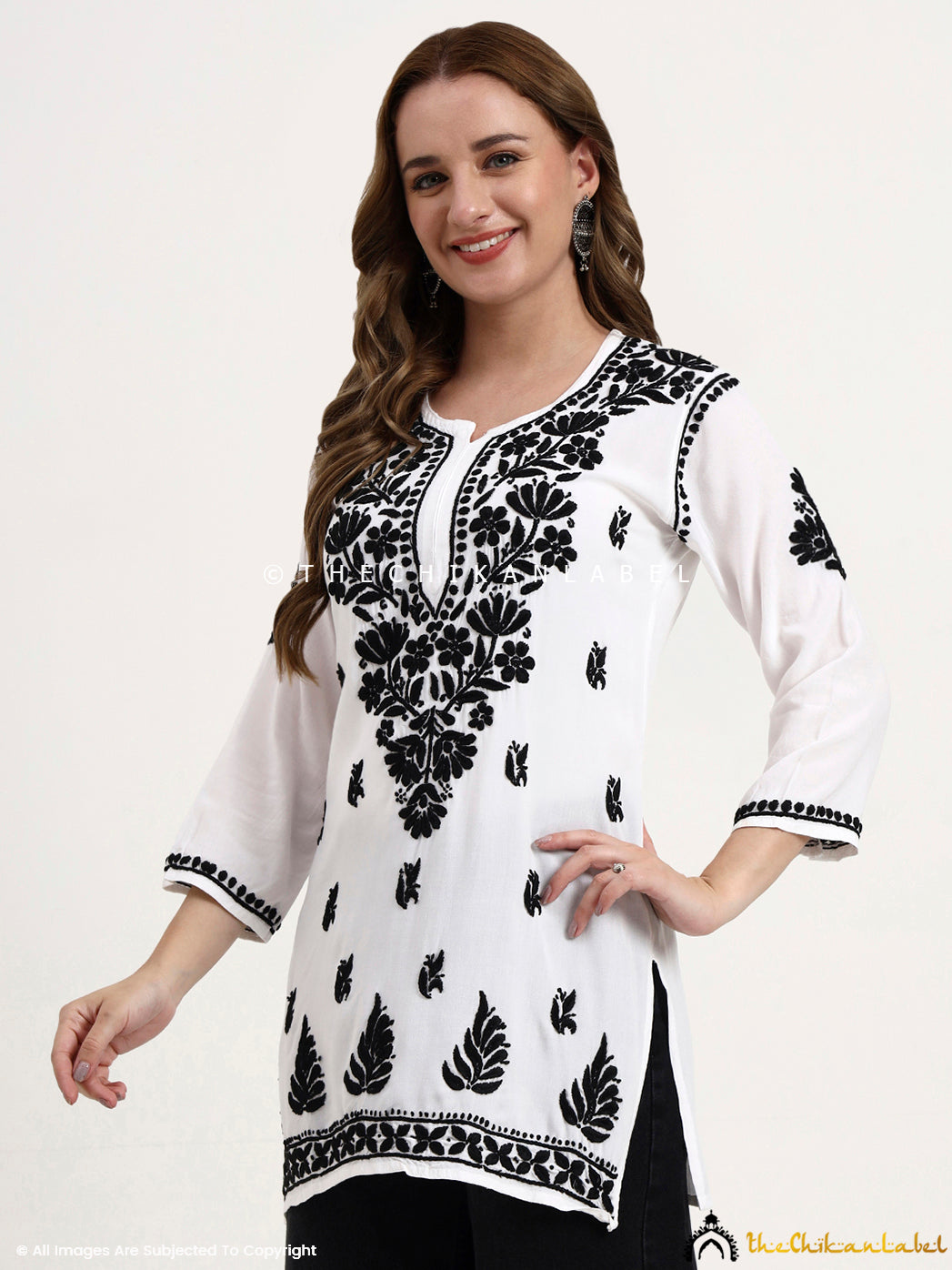 Stylish chikankari short top crafted in soft rayon, suitable for pairing with jeans, palazzos, or ethnic pants.