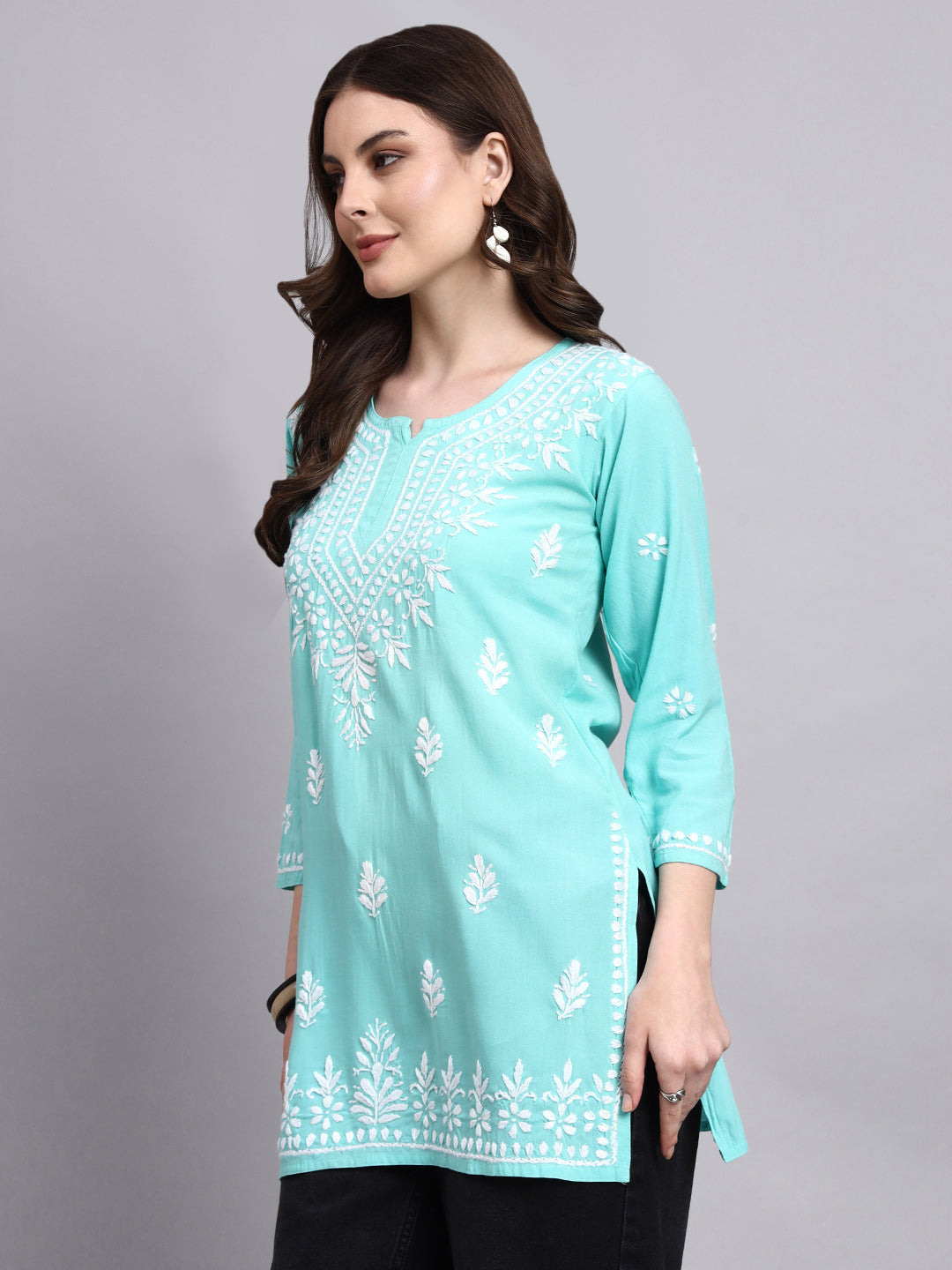 Women’s rayon short kurta showcasing authentic chikankari hand embroidery for ethnic and fusion wear