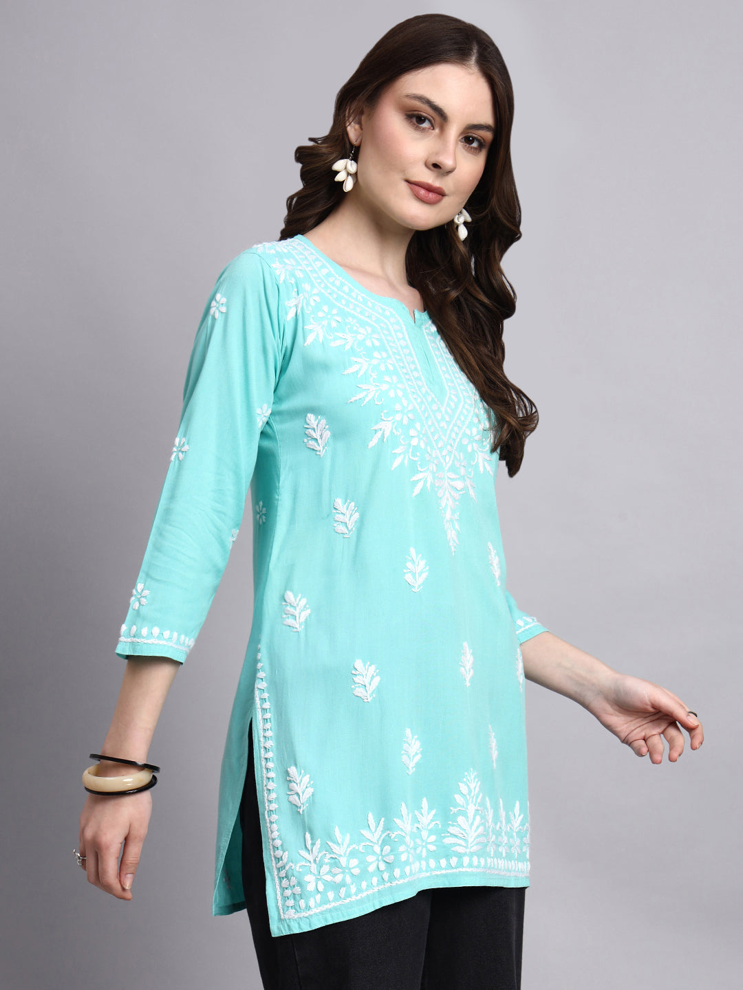 Trending short top designed as a rayon kurta with delicate handmade chikankari work