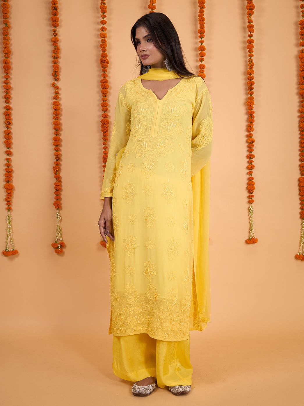 Full outfit view of the Shahana kurti palazzo set with dupatta, combining intricate traditional embroidery with a flowing silhouette for festive occasion styling.