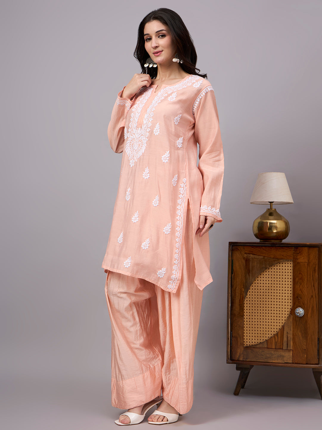 Traditional Indian ethnic wear for women featuring Chanderi kurta with detailed Lucknowi Chikankari embroidery and Farshi bottom