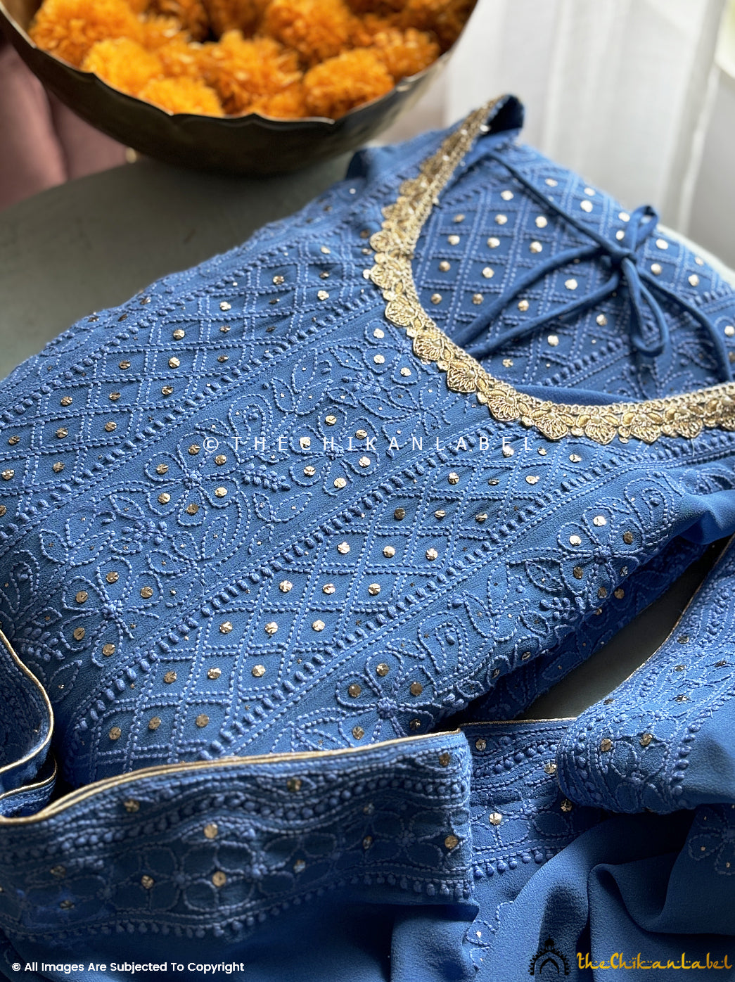 Viscose chikankari Anarkali styled with ethnic glam for a regal and traditional fashion photoshoot

