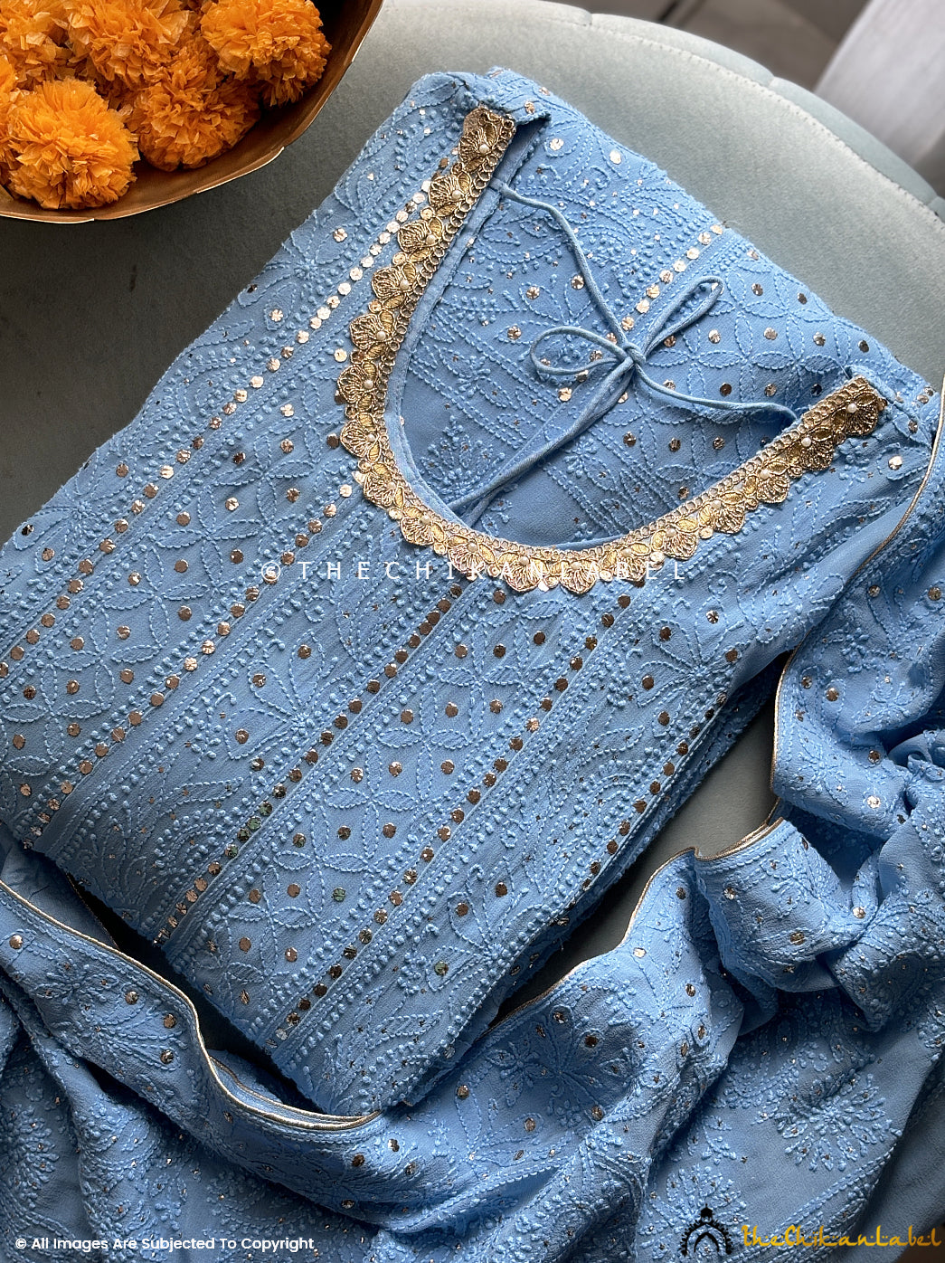 Model wearing luxe Anarkali with fine embroidery details ideal for mehendi, sangeet, or wedding functions

