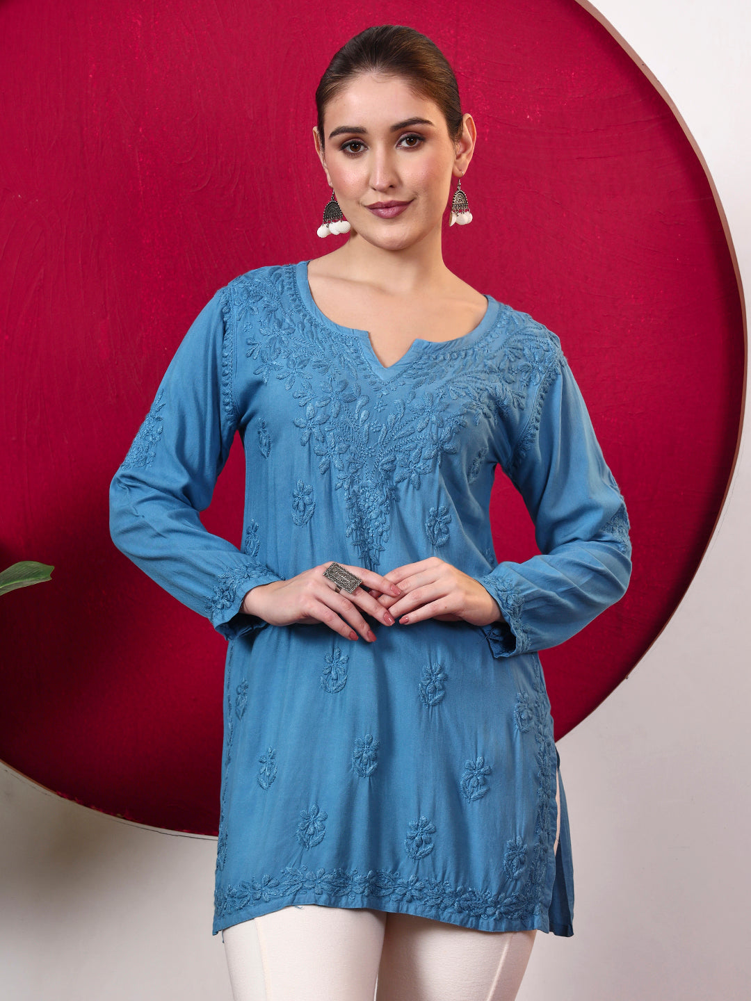 Shruti Rayon Short Kurti styled as an elegant everyday ethnic top with intricate Chikankari embroidery, relaxed fit and soft rayon fabric suitable for work and casual occasions.