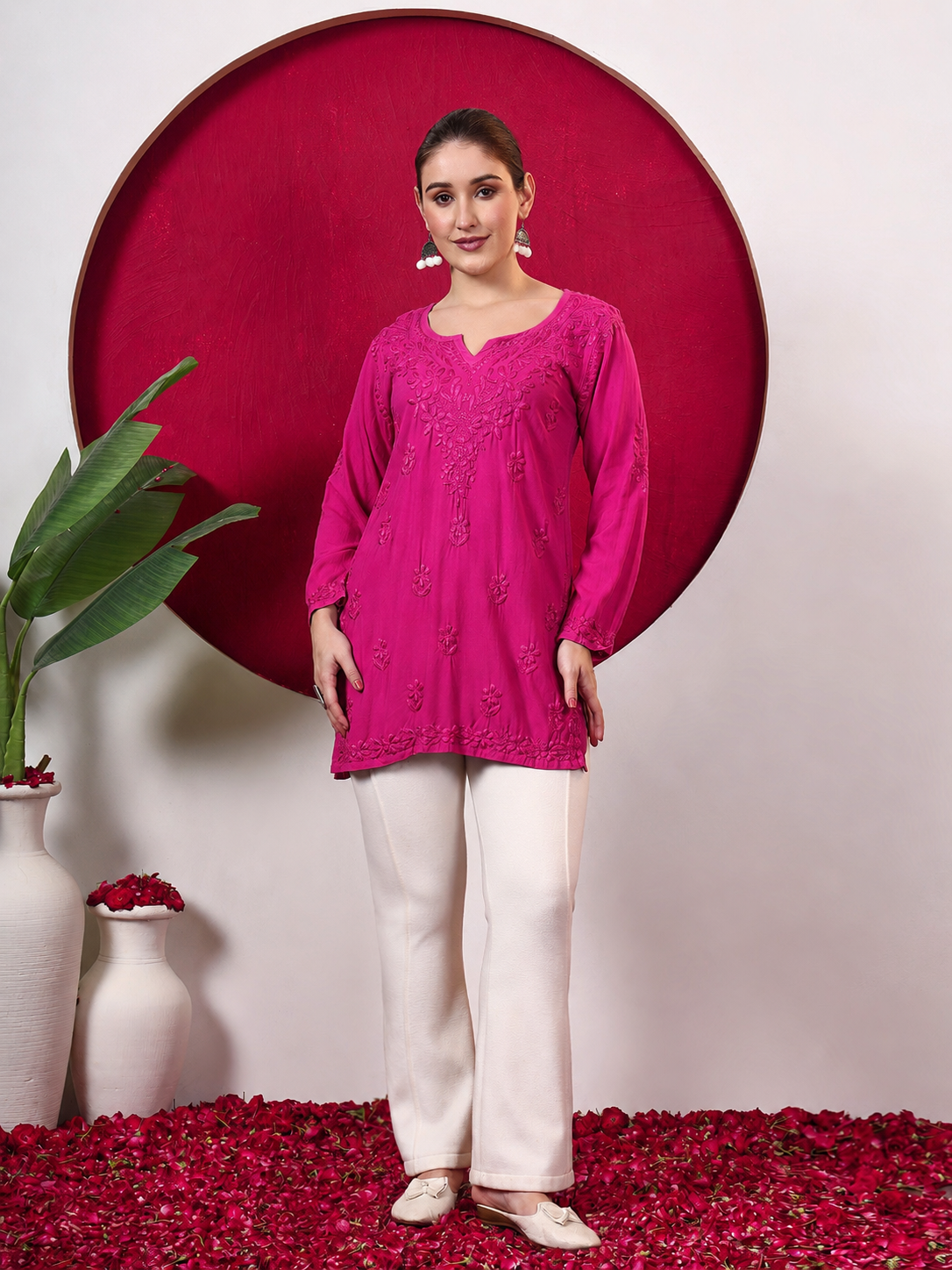 Women’s trending top with detailed Chikankari embroidery, soft rayon construction, full sleeves and a relaxed straight fit suitable for contemporary ethnic and Indo-western styling.