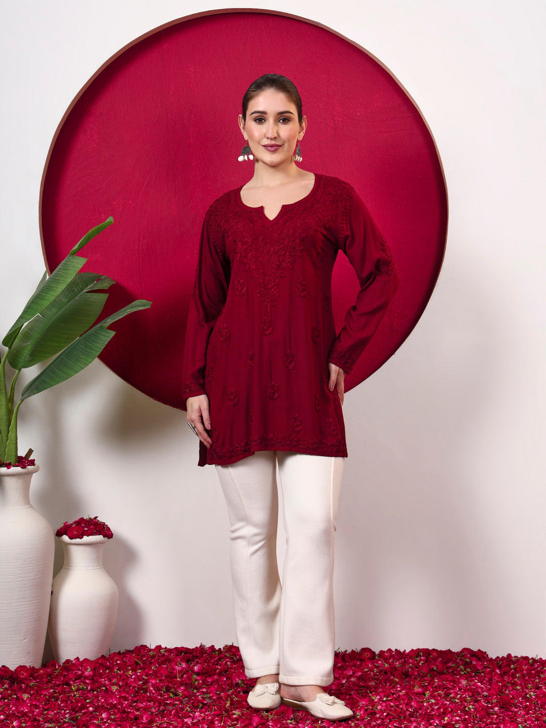 Elegant women’s rayon short kurti with traditional Chikankari embroidery, floral motifs and a relaxed fit, ideal for college, office, shopping and casual everyday wear.