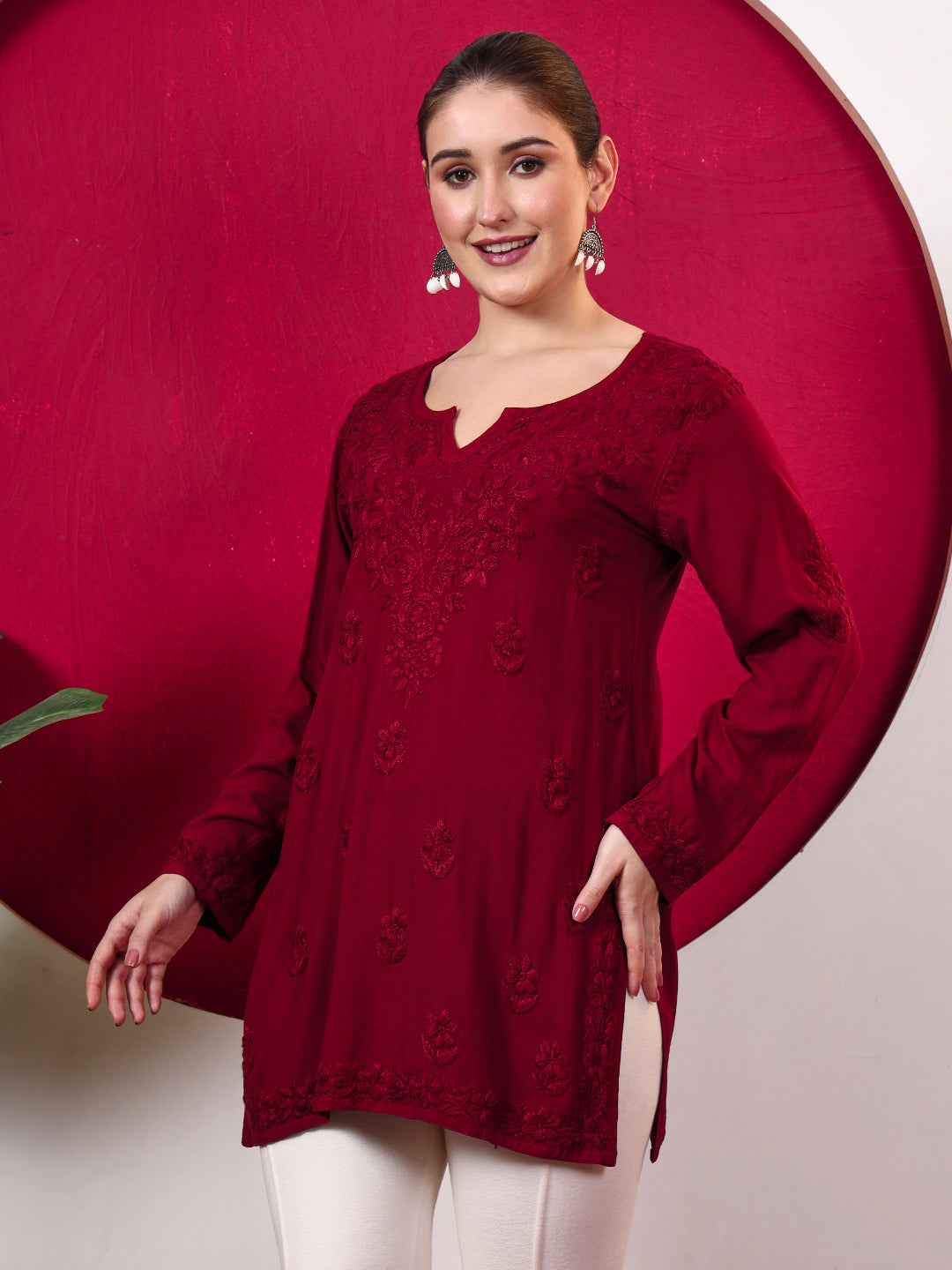 Women’s trending top with detailed Chikankari embroidery, soft rayon construction, full sleeves and a relaxed straight fit suitable for contemporary ethnic and Indo-western styling.